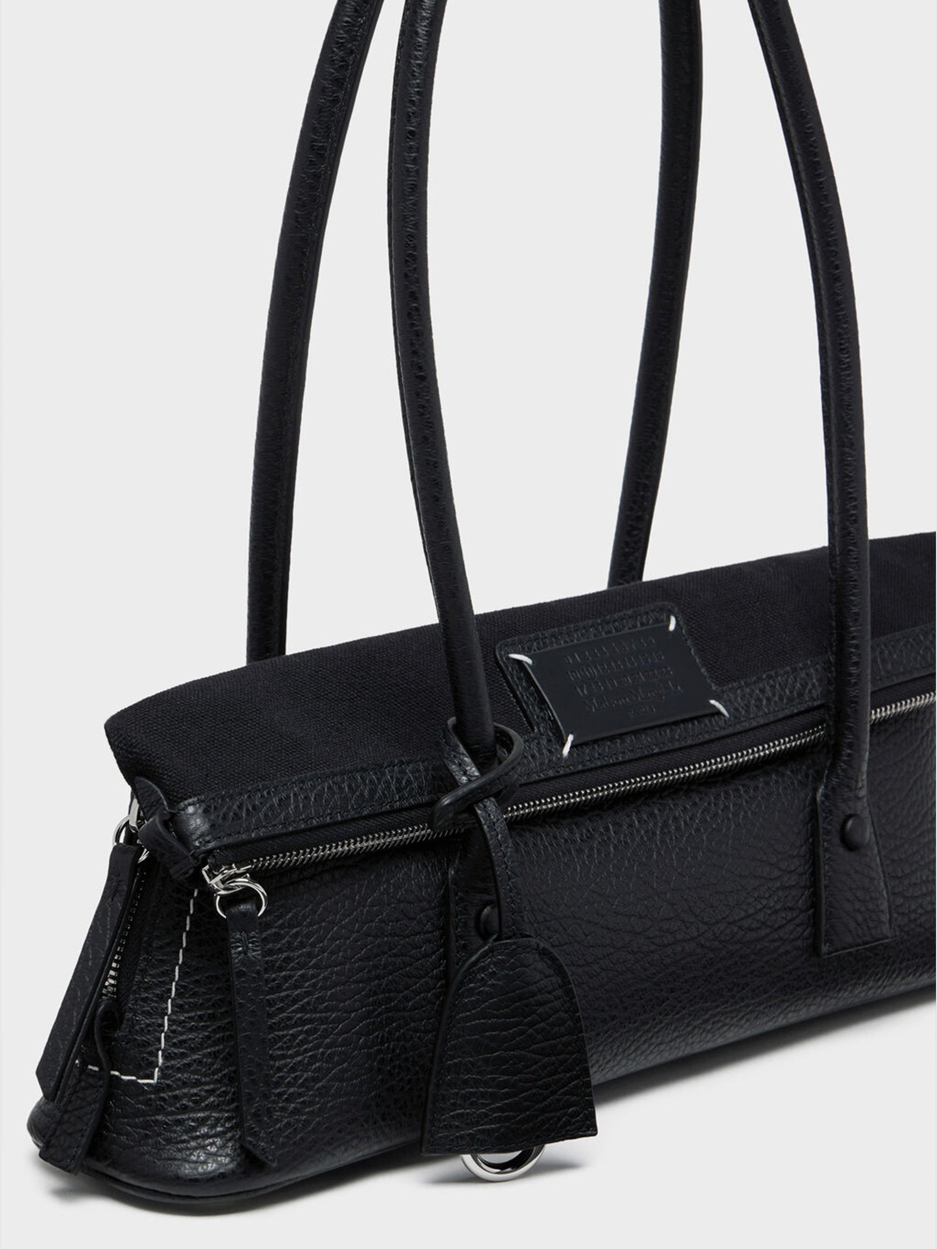 Maison Margiela 5AC Shoulder East West bag angled side view showing detachable strap