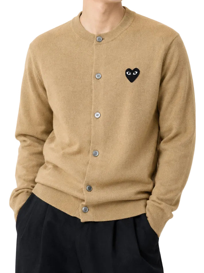 COMME des GARÇONS PLAY Unisex Round-Neck Knit Black Heart in Light Camel worn on model, front view