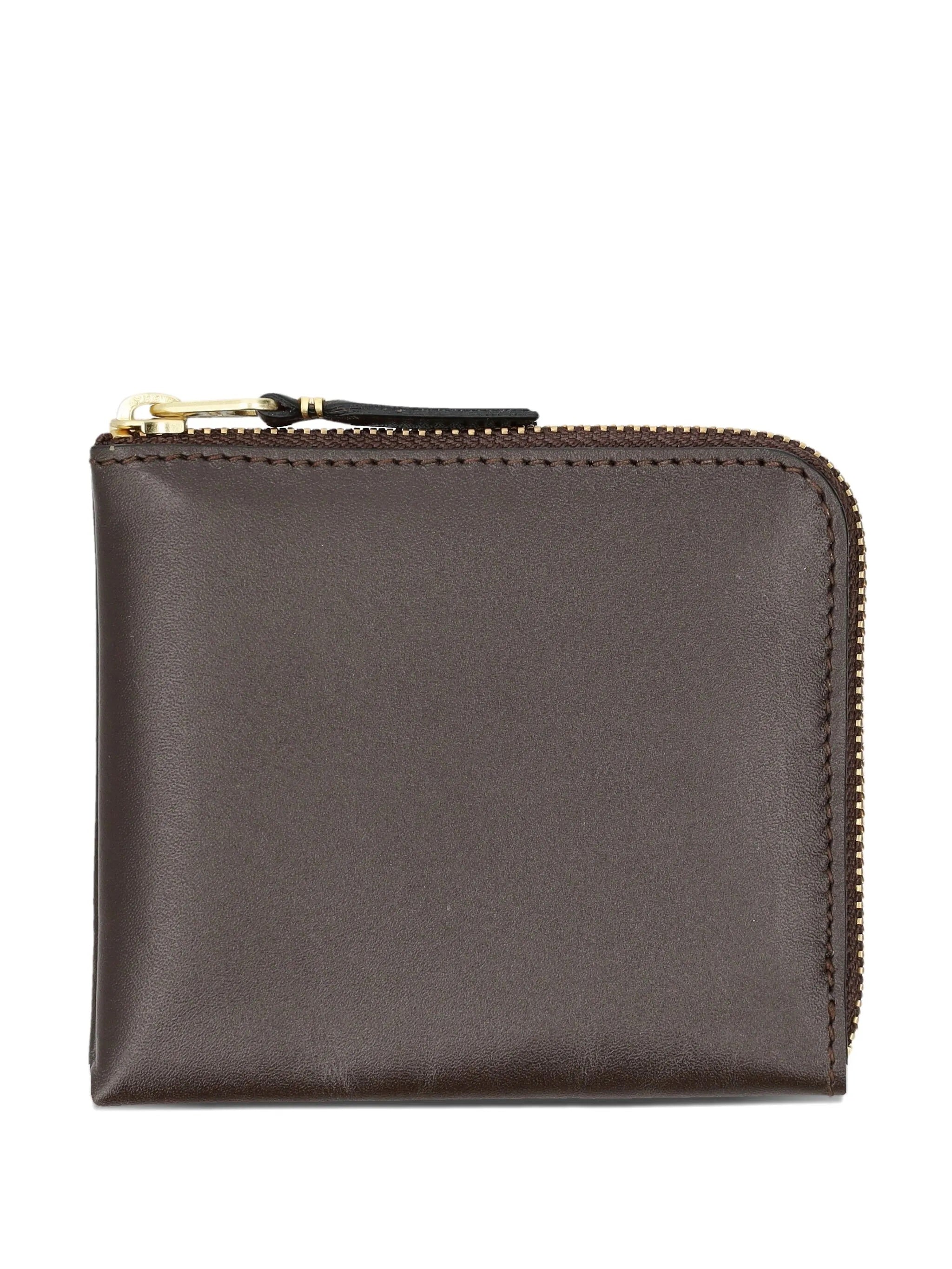 Brown leather wallet with a zipper on a white background