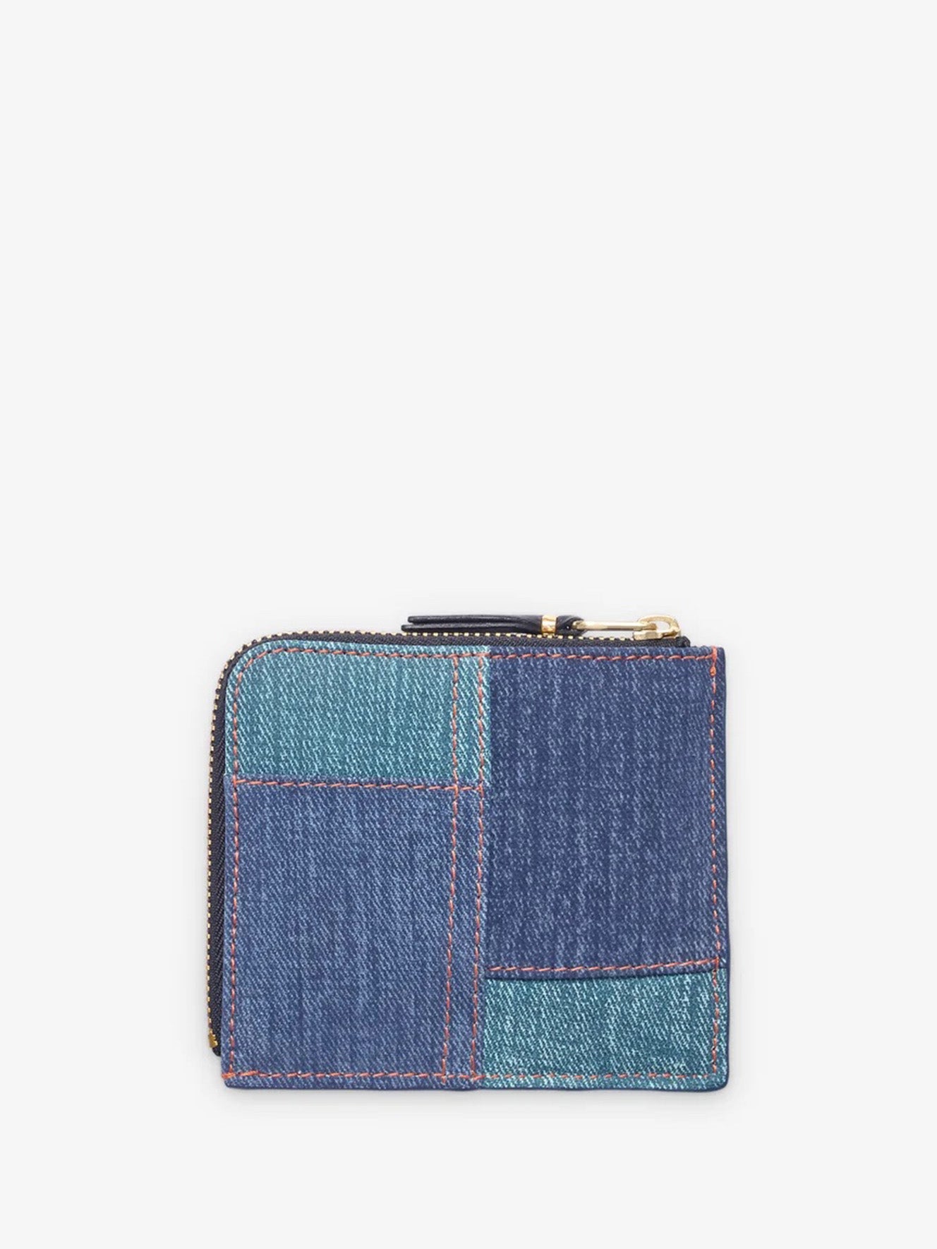 Back view of the SA3100DP Wallet from Comme des Garçons Wallet, with denim patchwork design.