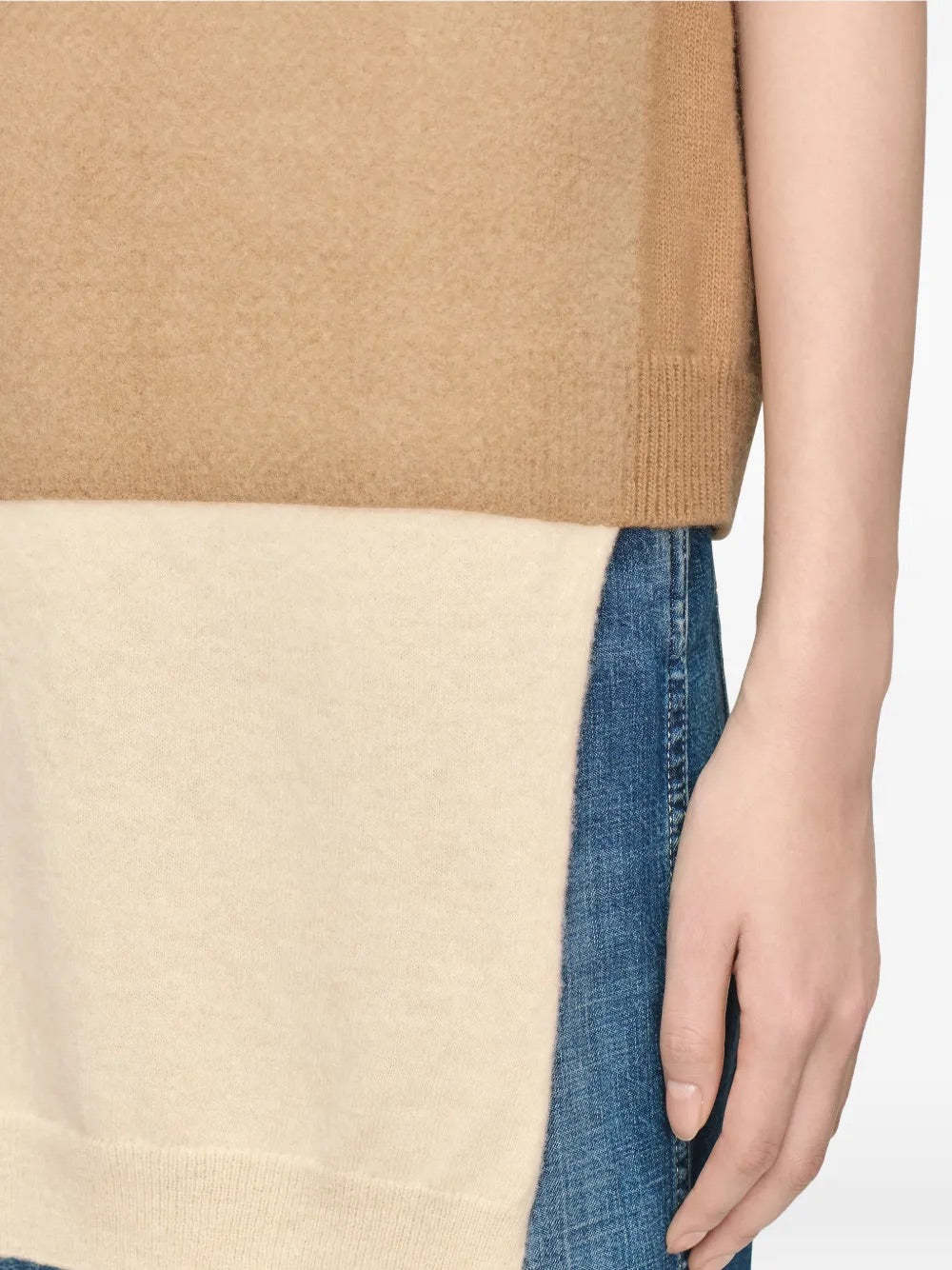 Close-up of Maison Margiela Fuse Knit Vest in Camel/Ecru hem and knit detail.