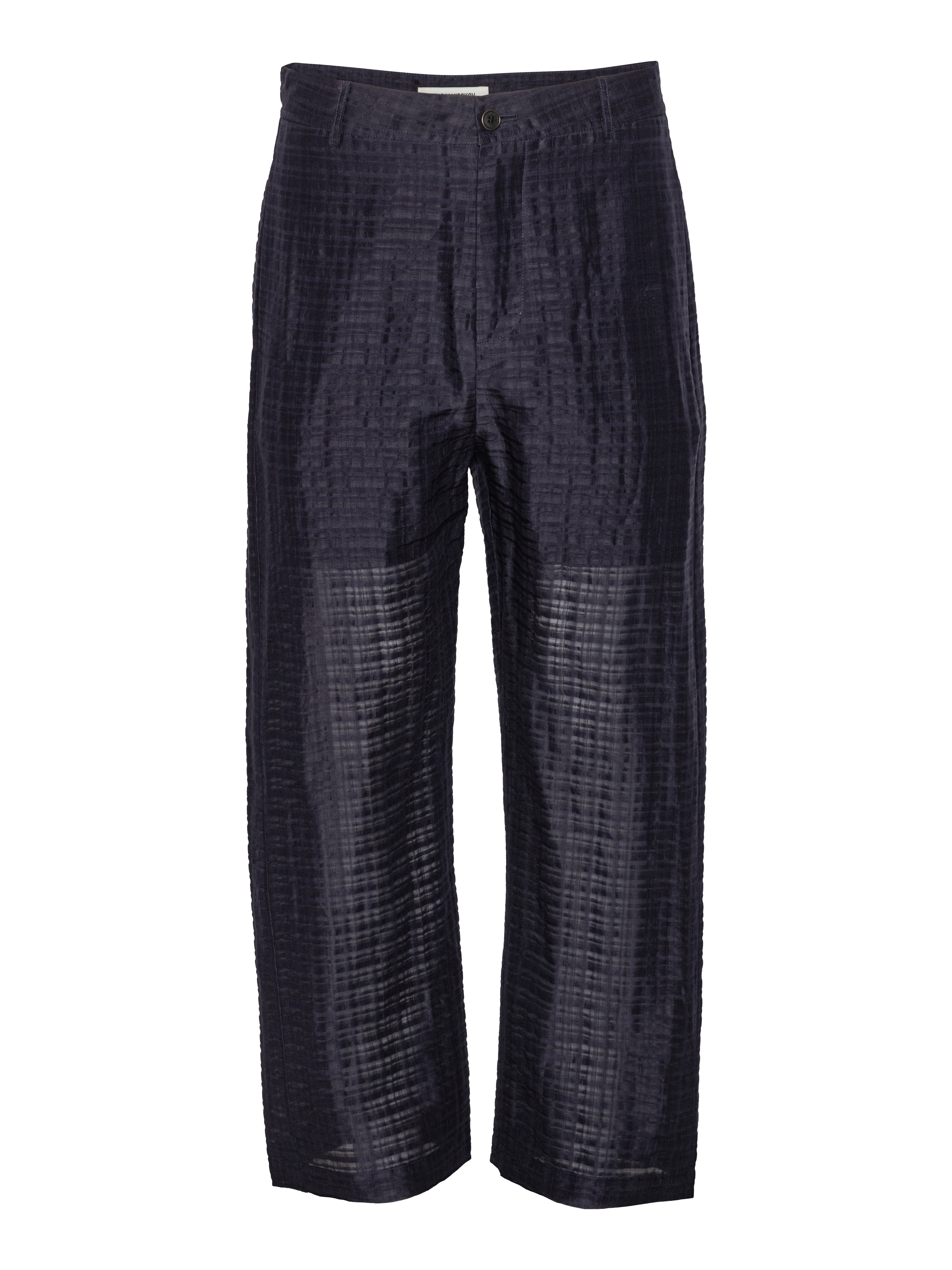 Front full-body packshot of the Artist Pants in navy from Henrik Vibskov Spring/Summer 2026 Studio Collection, featuring straight legs, a front button and zipper closure, side pockets, and a unisex silhouette.