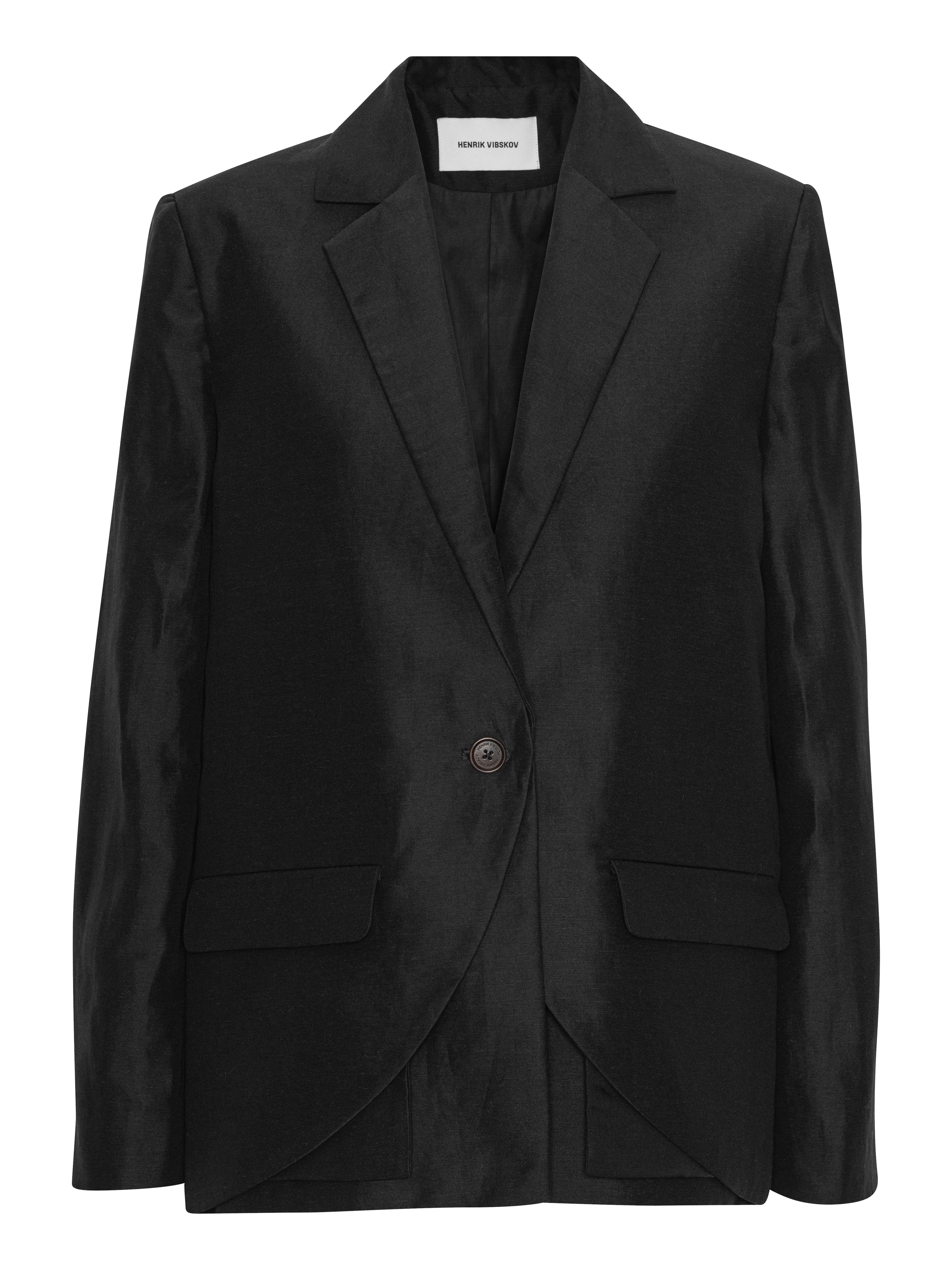 Front view of the Beetle Blazer in black Tencel-linen blend with layered design, single-button front closure, and two front pockets.