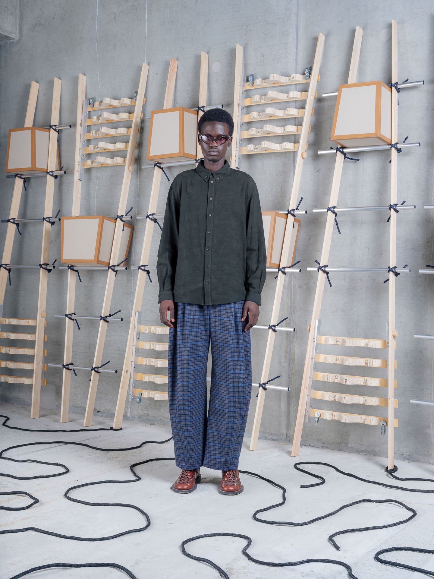 Henrik Vibskov Block Shirt Black, model front view, shirt styled with checked trousers