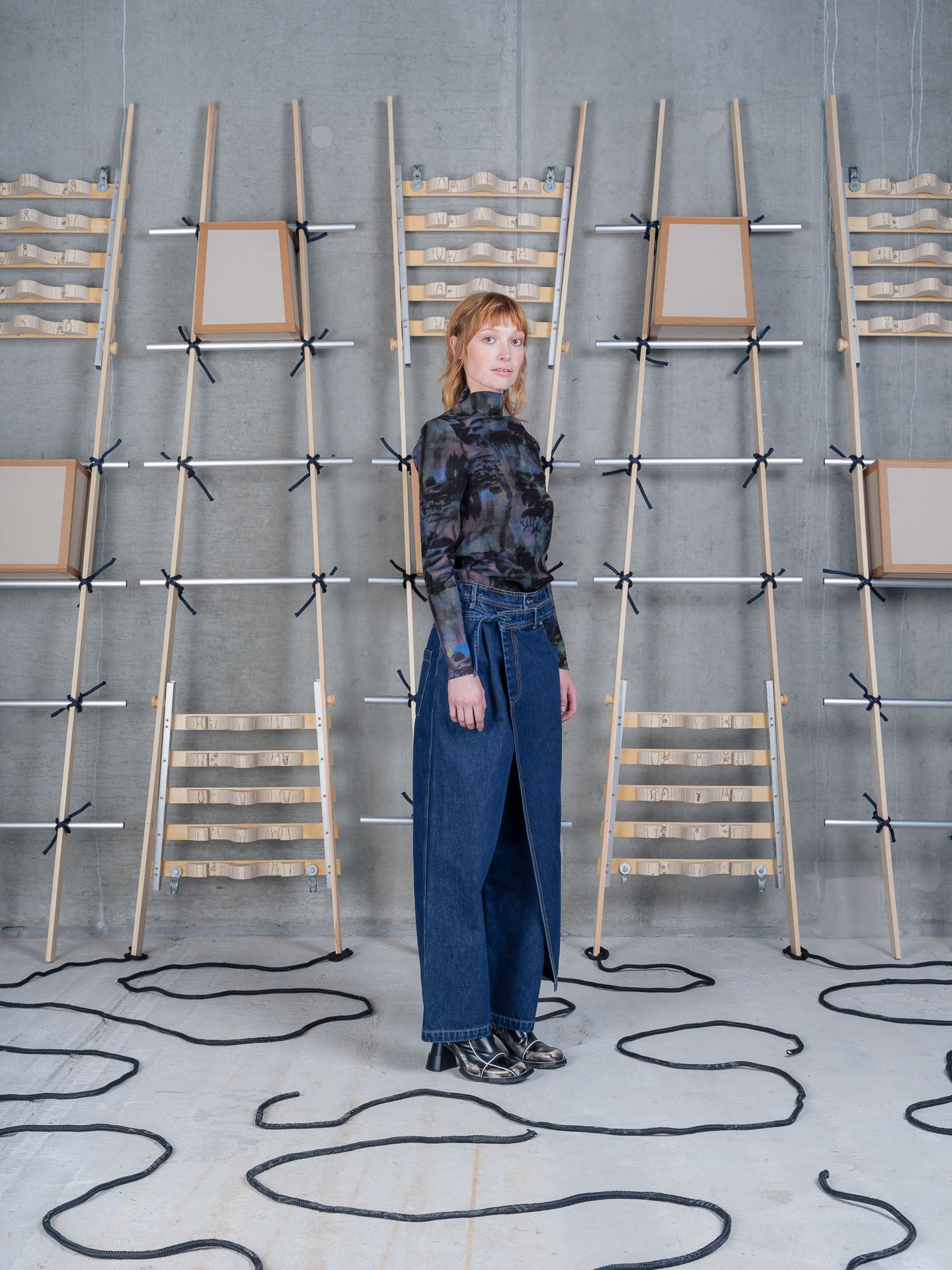 Model wearing the Henrik Vibskov Carry A Top in Mushroom Tapestry print, side view