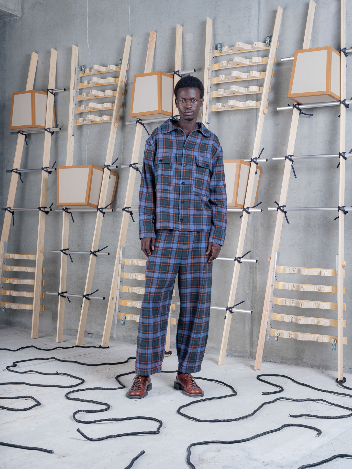 Henrik Vibskov Eclipse Pants Blue Flannel Checks, model front view, styled as a co-ord with matching Field Shirt