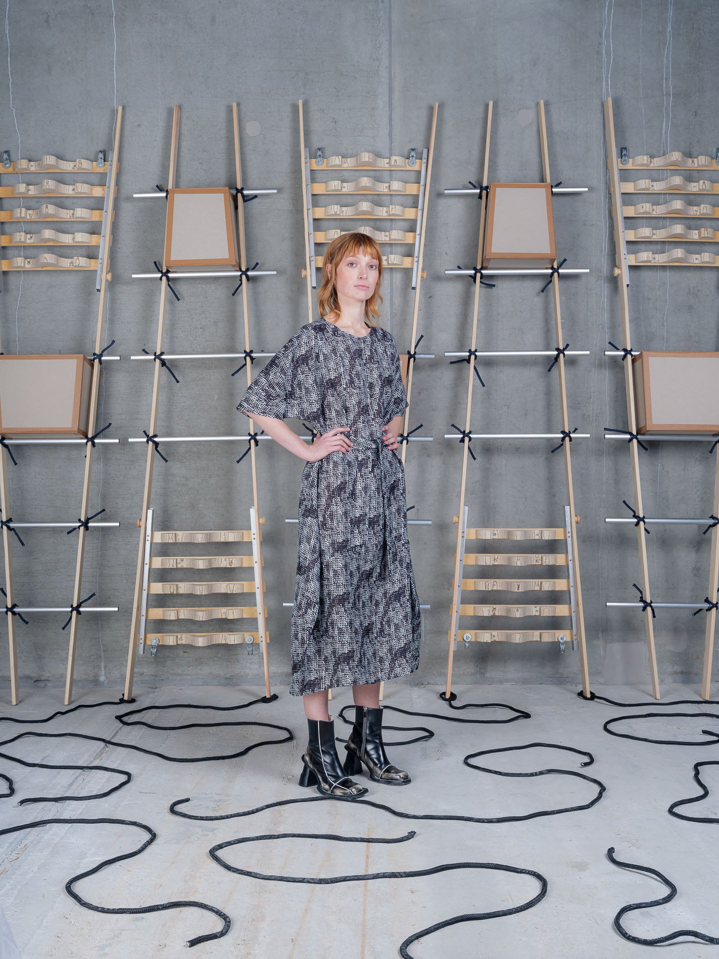 Model wearing the Henrik Vibskov Frown Silk Dress in Jumping Gents print, front view