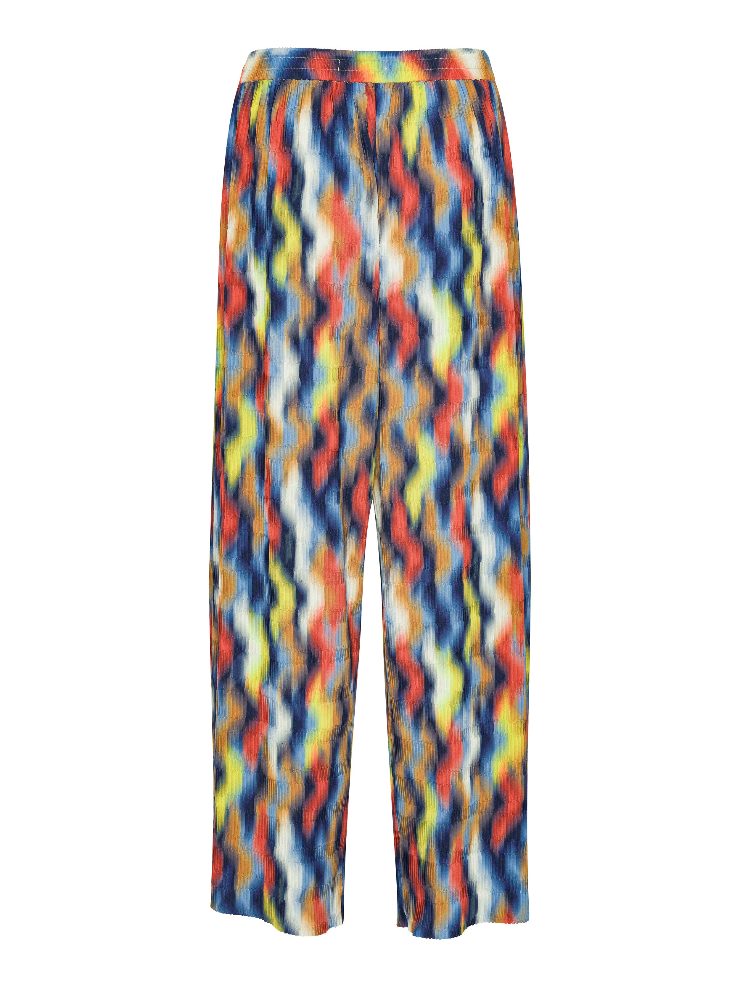 Colorful abstract patterned pants from Henrik Vibskov on a white background