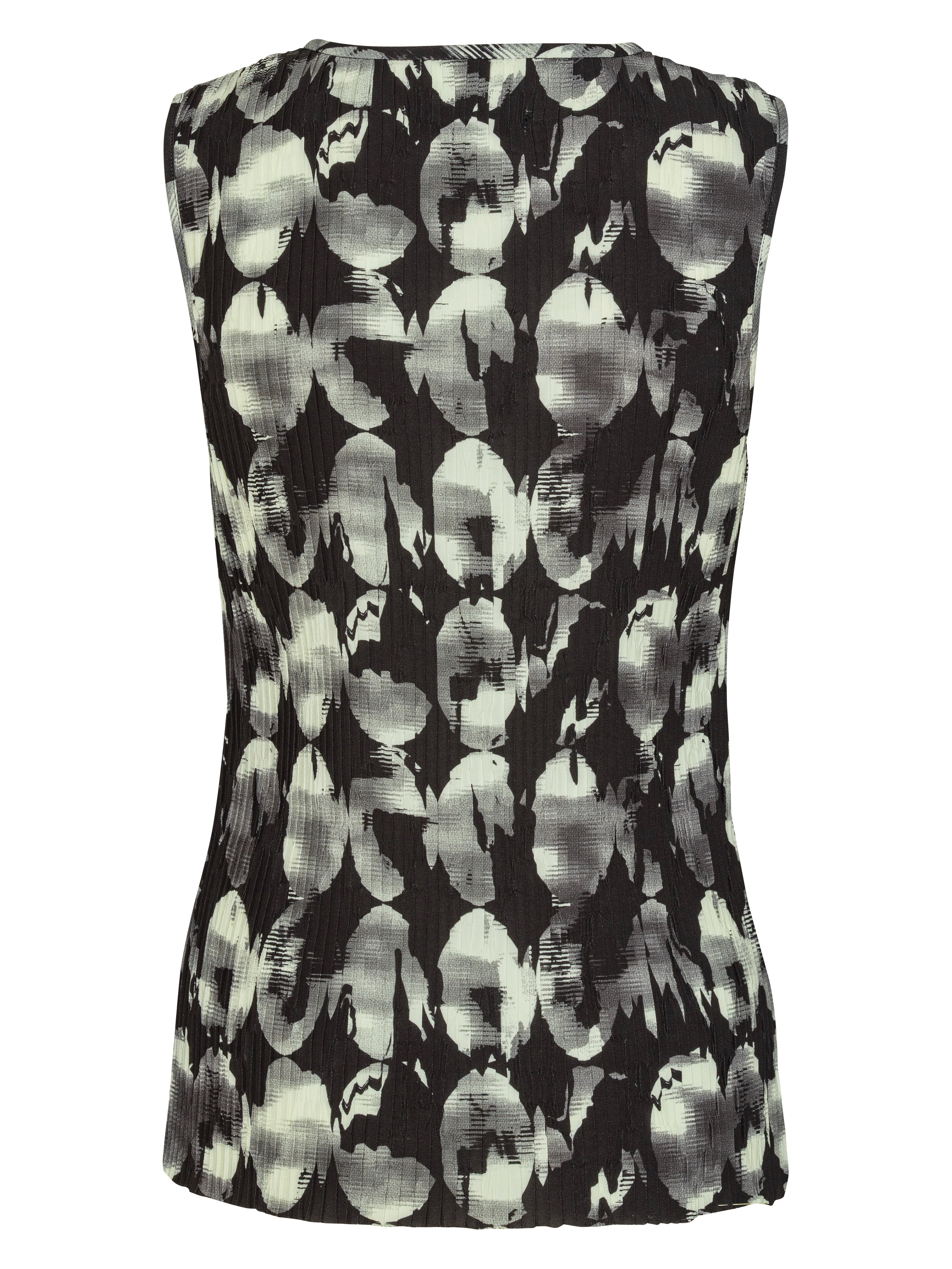 Back view of black and white patterned sleeveless top from Henrik Vibskov on a white background