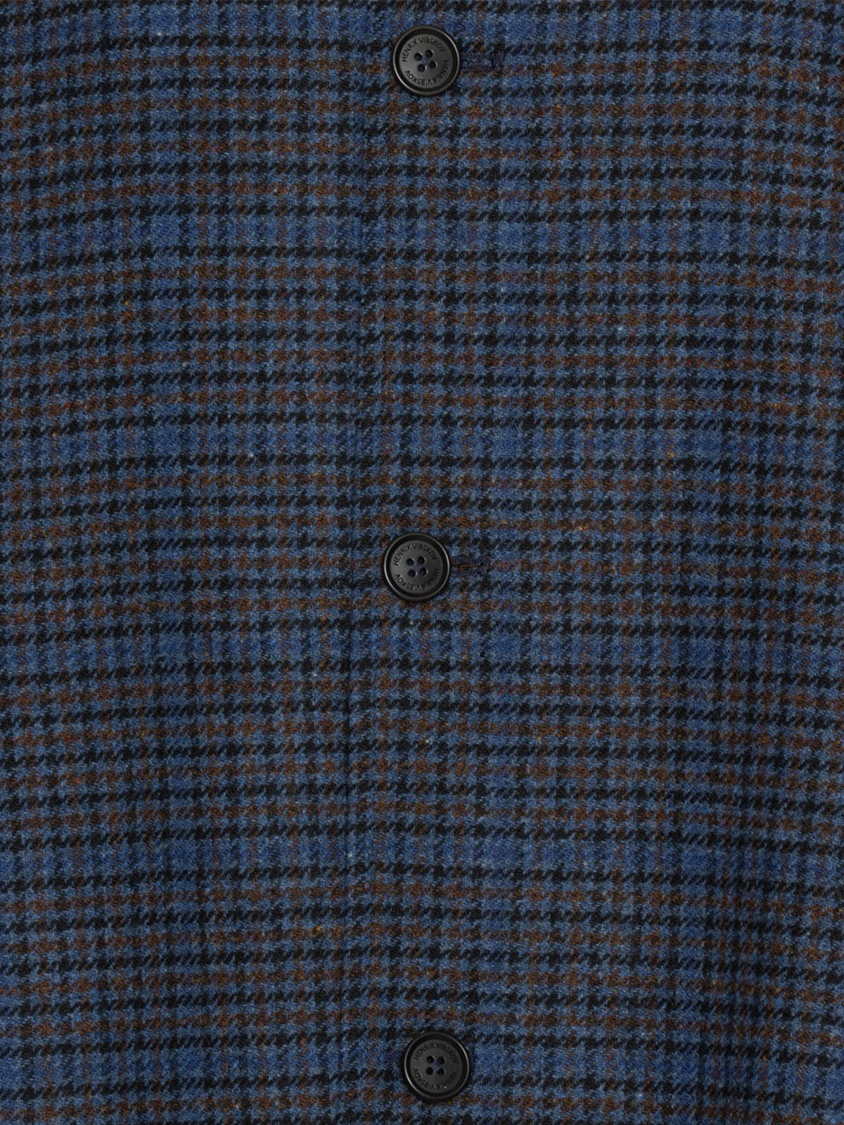 Henrik Vibskov Uncut Jacket Blue Wool Checks, close-up detail of houndstooth wool fabric and button placket