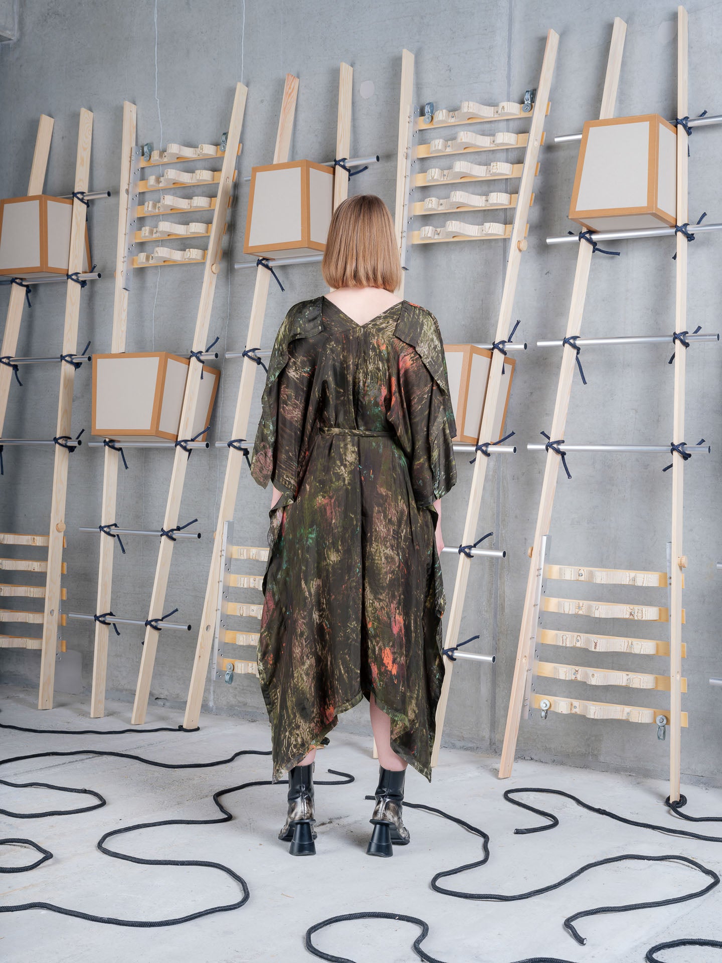Model wearing the Henrik Vibskov Uncut Kaftan in Swamp Reflections print, back view