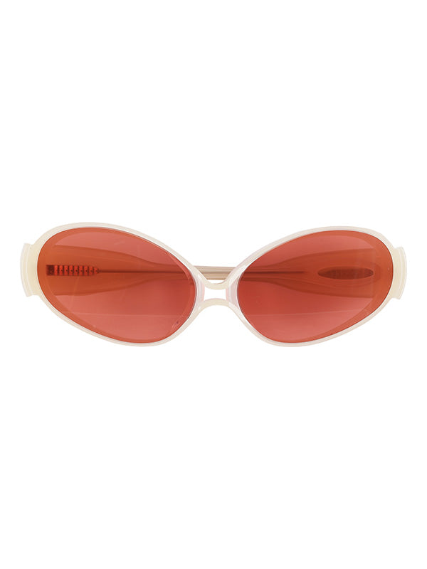Sunglasses with red lenses and a white frame on a white background
