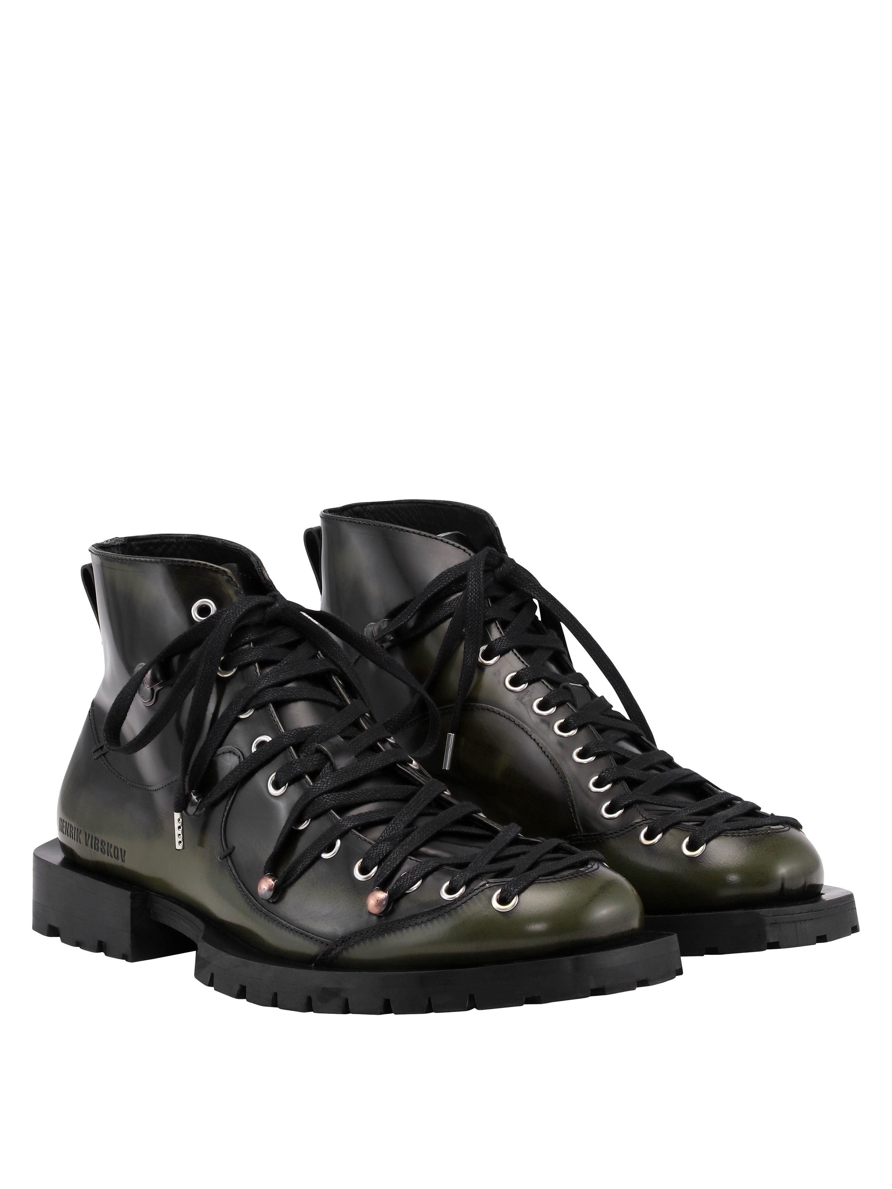 Henrik Vibskov Kelly Boots in Green Brush Off leather with lace-up front and chunky rubber sole.e