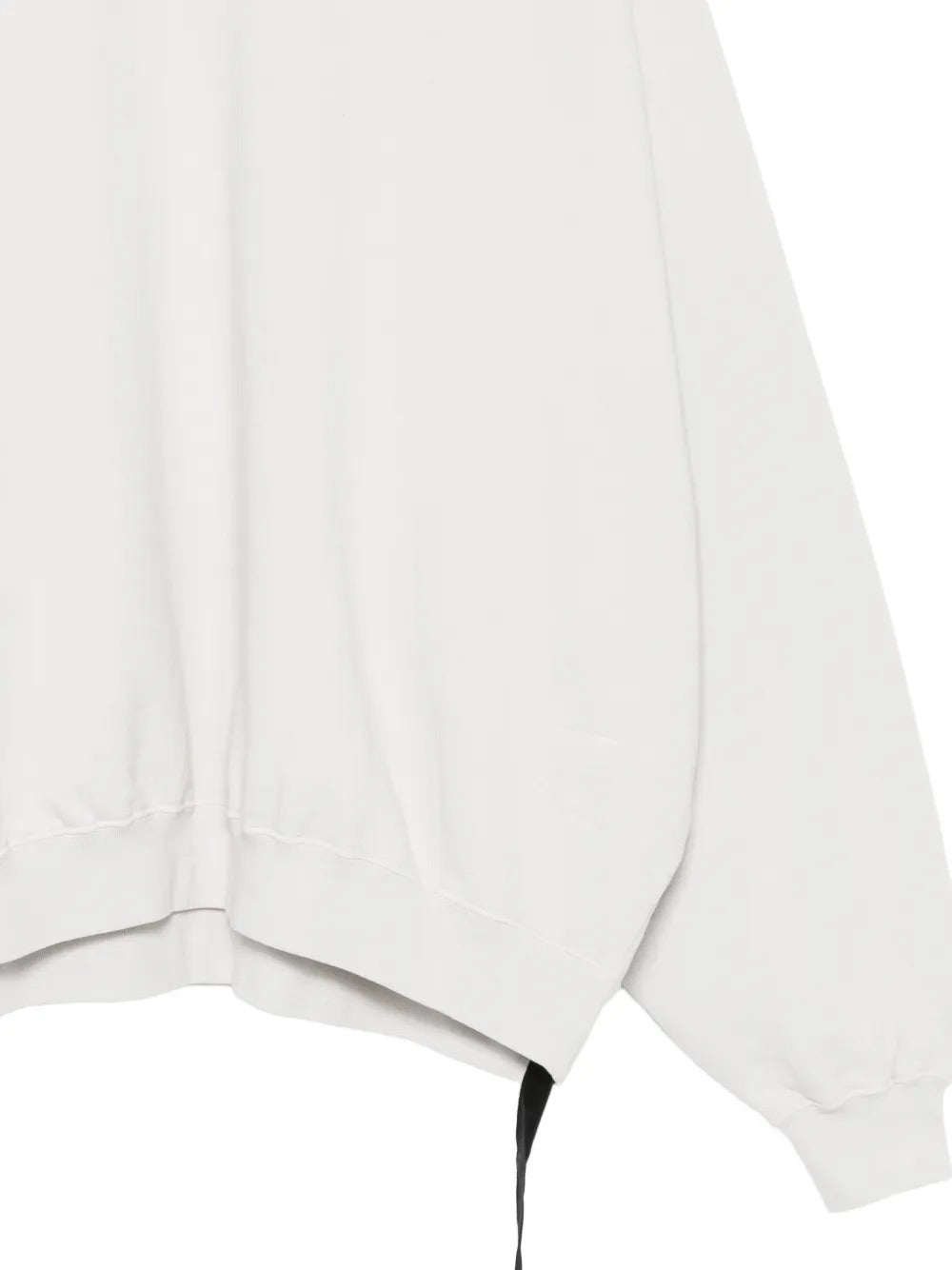 Rick Owens DRKSHDW Hun Crewneck Sweatshirt in Milk Wash close-up of ribbed hem and signature drawstring detail