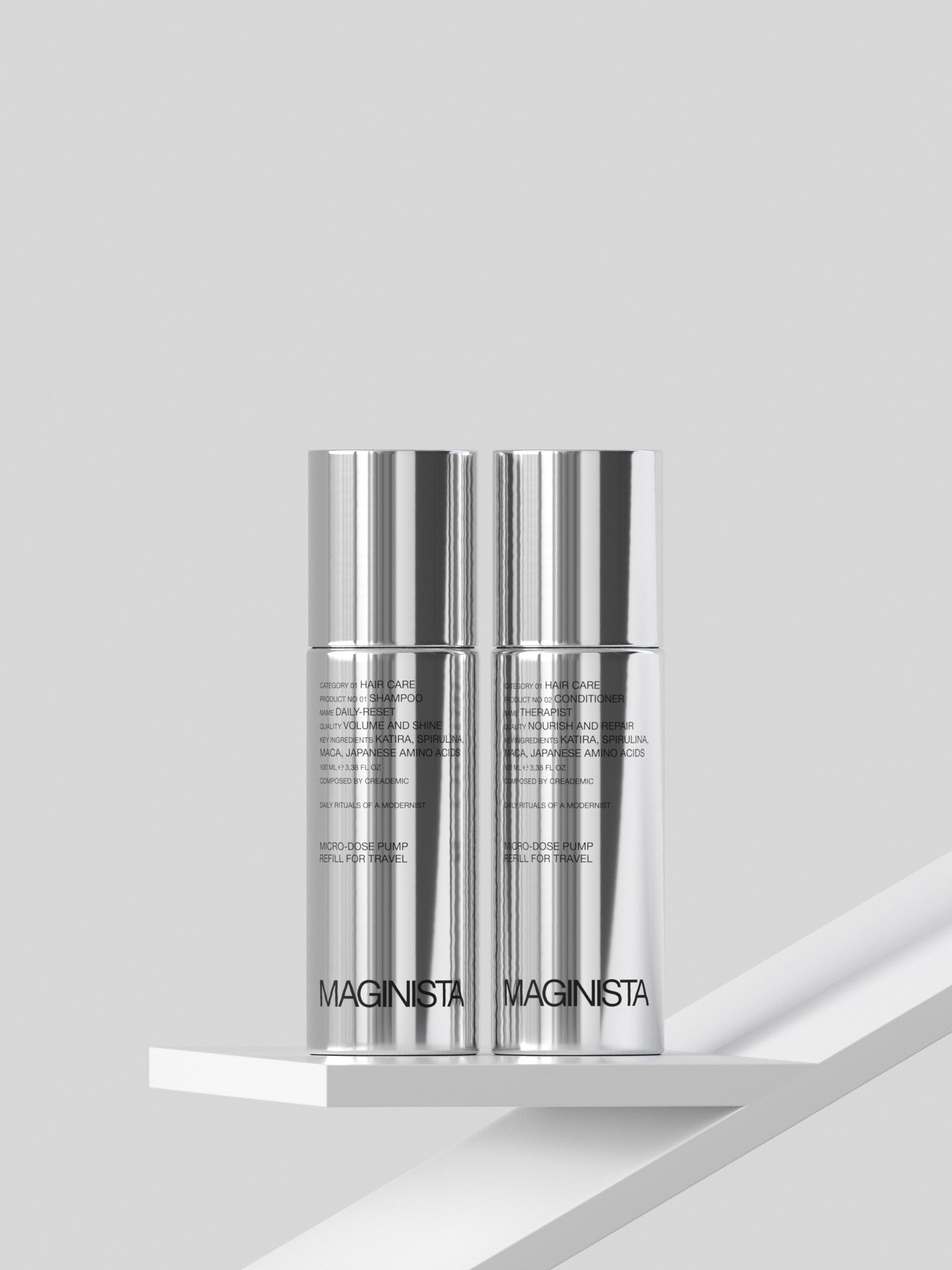 Two silver skincare containers with 'MAGINISTA' branding on a light gray background