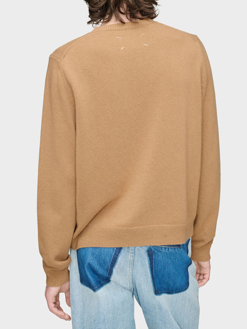 Back view of Maison Margiela Fused Knit Wool Crewneck Sweater showing signature four white stitches on camel lambswool