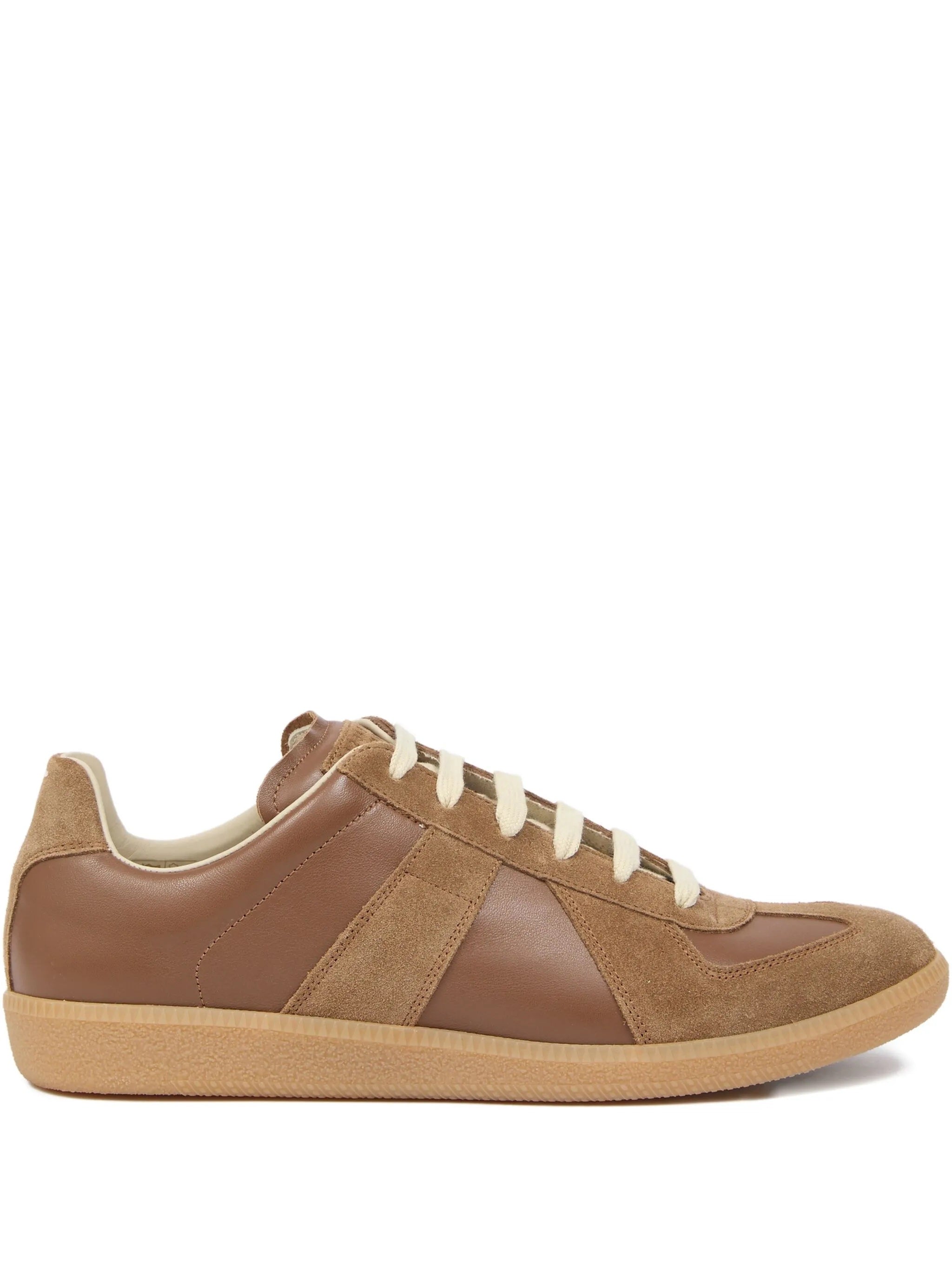 Brown leather sneakers with panel design from Maison Margiela on a white background