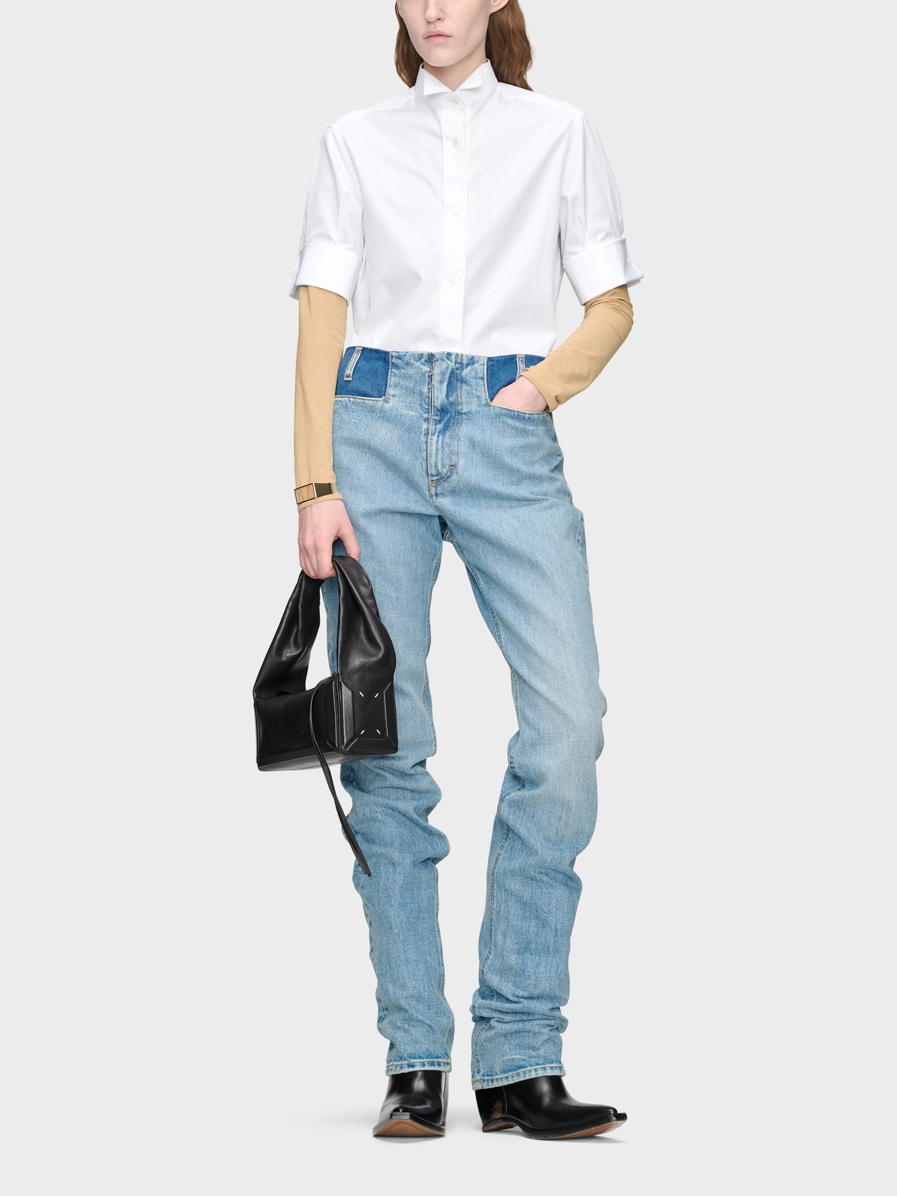 Maison Margiela Snapped Button Short Sleeves Shirt in White worn on model, full-length view, spread collar, button-front fastening, relaxed oversized fit