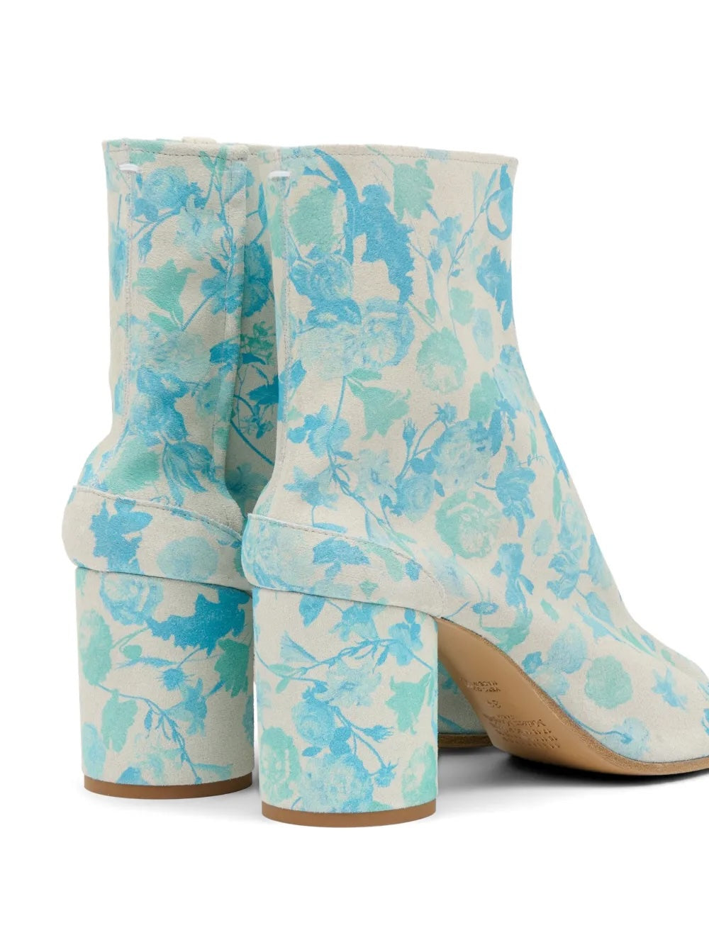 Maison Margiela Tabi Ankle Boot 80mm, angled rear close-up highlighting the structured block heel, back zip closure, and Margiela stitch pin in floral suede