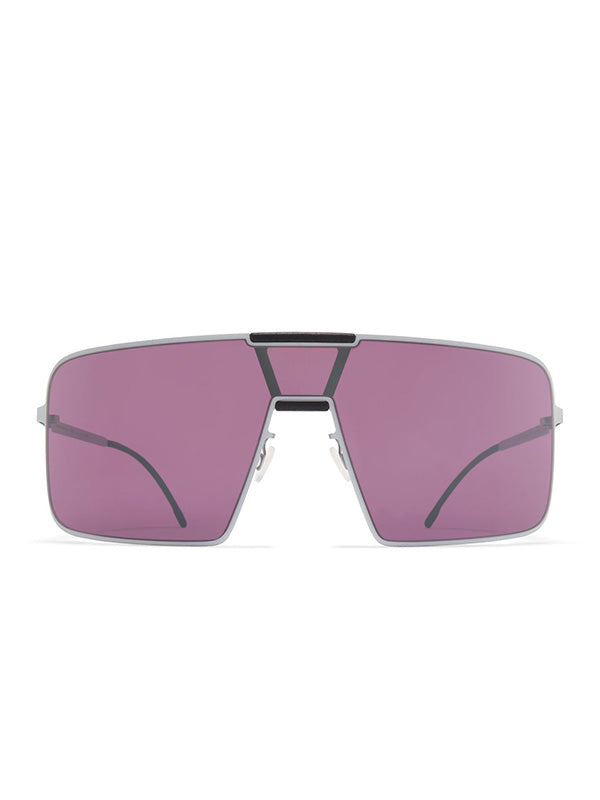 Mykita x Rimowa Navigator Sunshield MR004 in white and mulberry, front view showing oversized single-lens shield silhouette with mulberry tinted lens, white metal frame, and structured black nose bridge detail