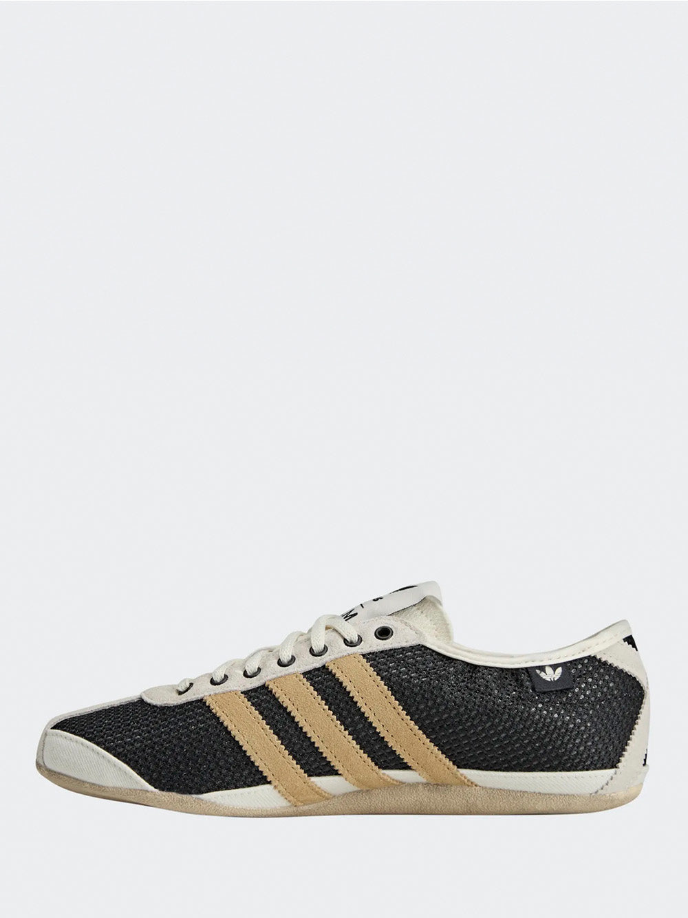 Adidas Tokyo W SFTM in Black/Beige/Gold - low side view showing black upper and beige rubber outsole