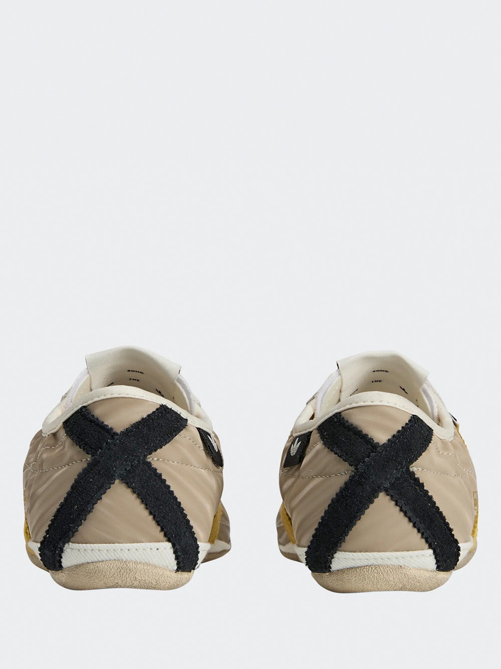 Adidas Tokyo W SFTM in Off White/Yellow/Black - back view of pair showing black heel detail and off white upper