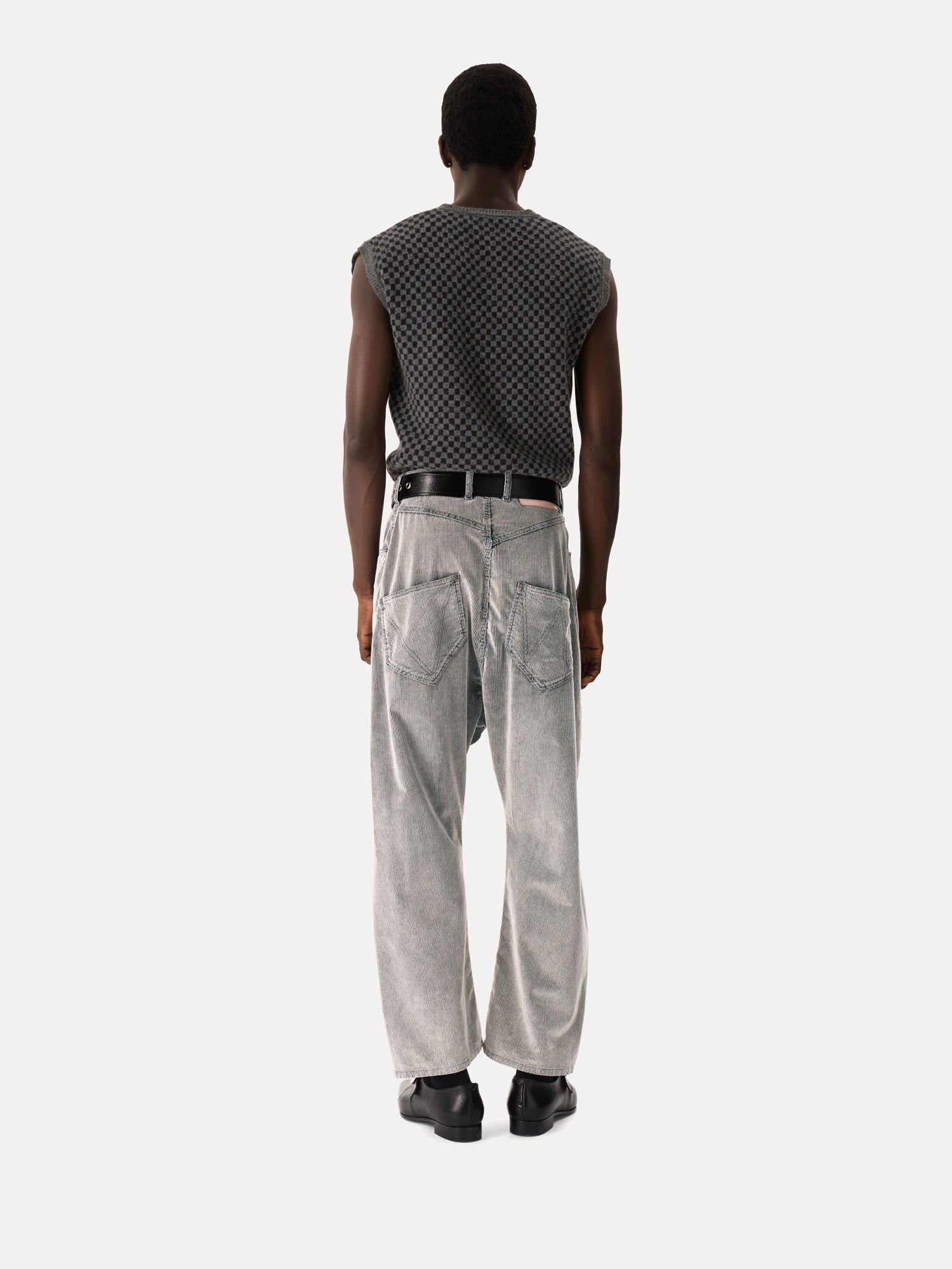 Back view of Vivienne Westwood Checkmate Vest in grey navy checkerboard jacquard with ribbed hem and sleeveless cut