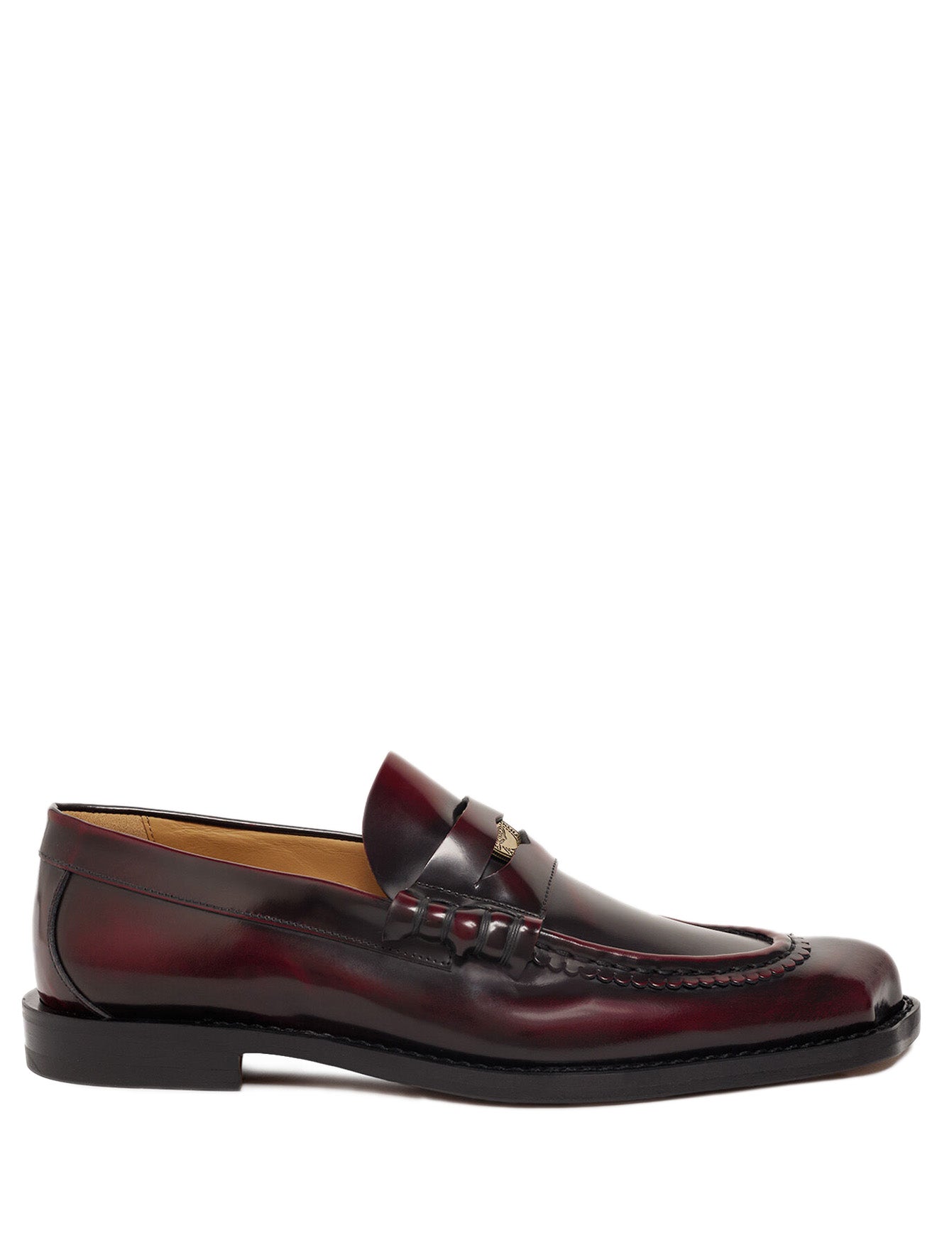 Dark red leather loafer shoe from Vivienne Westwood on a white background