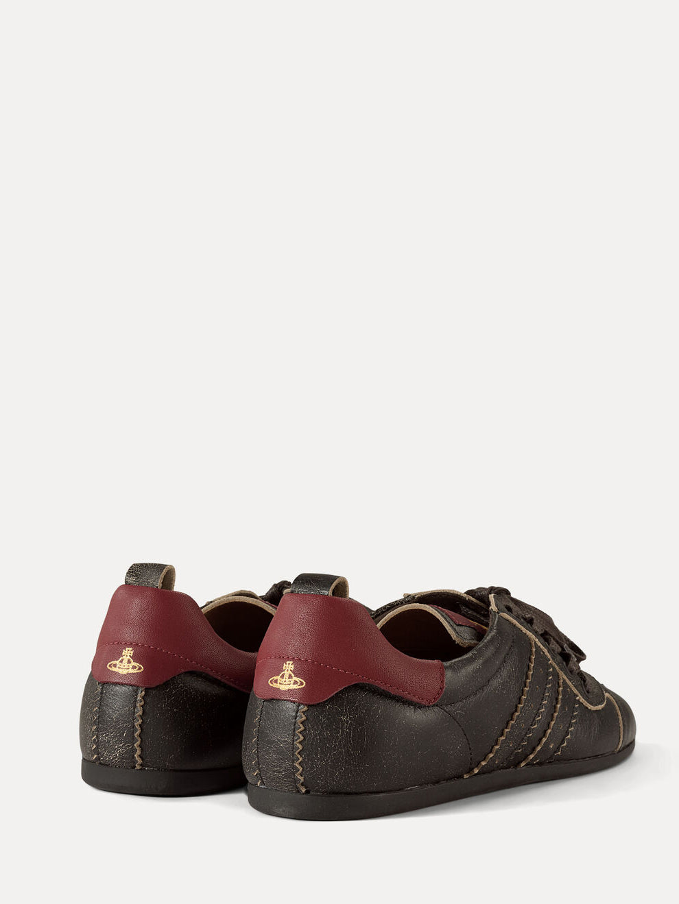 Back view of Vivienne Westwood Drunken Trainers in Off Black with contrast burgundy heel panels and worn leather finish