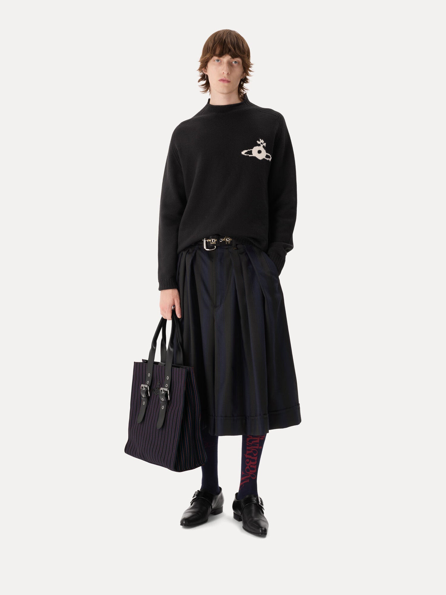 Model wearing Vivienne Westwood Fisherman Jumper in black with mock neck collar, straight boxy fit and orb chest detail