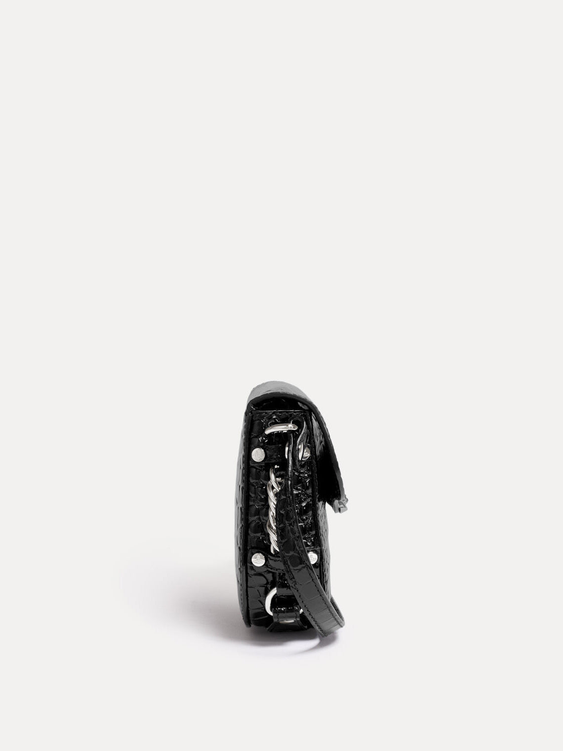 Side view of Vivienne Westwood Hunter Flap Crossbody in glossy black croc-effect leather showing compact curved silhouette and strap detail