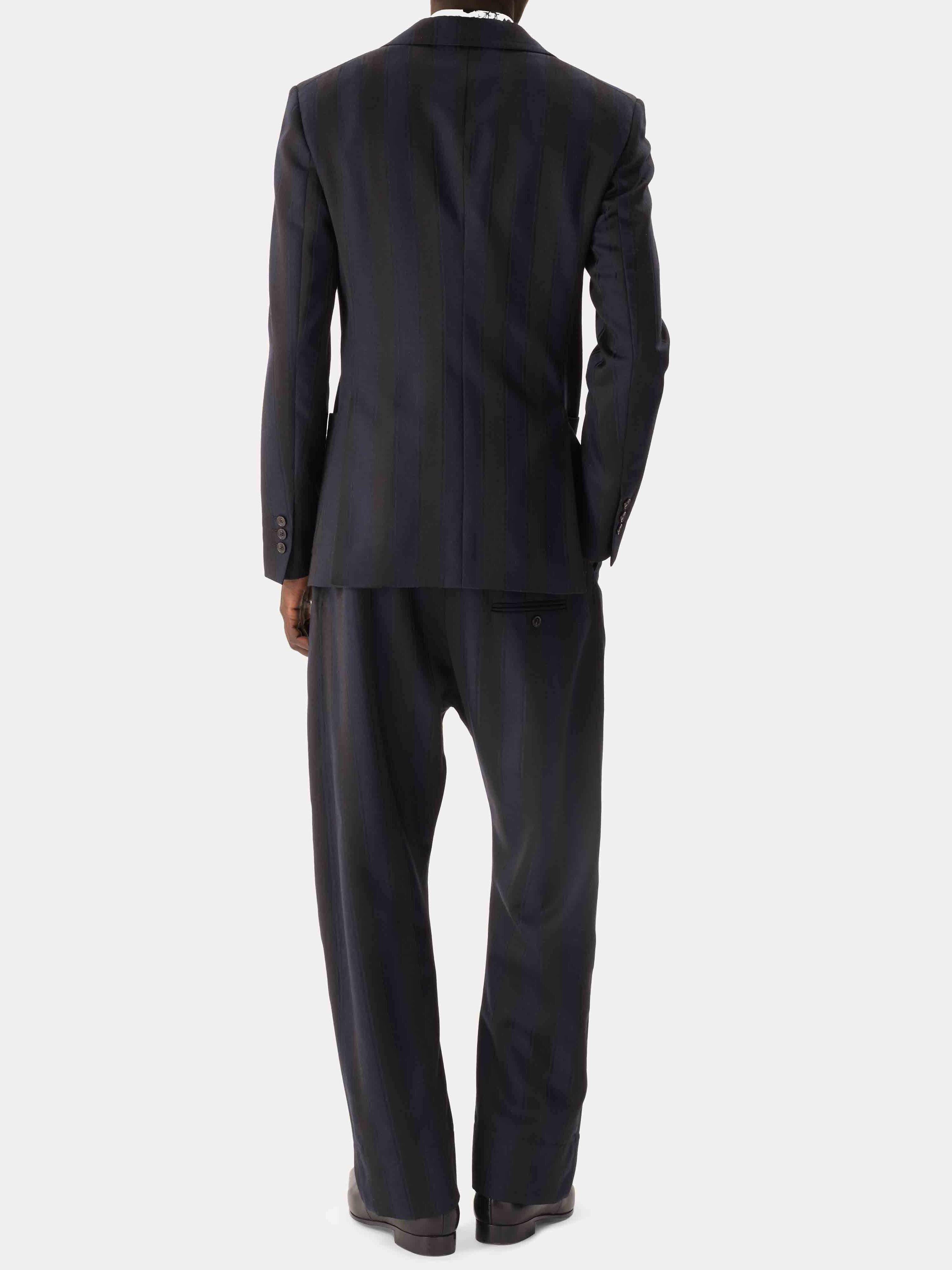 Back view of Vivienne Westwood Swing Corset Trousers in Midnight Blue Black showing detachable corset waistband, rear belt fastening and straight-leg fit