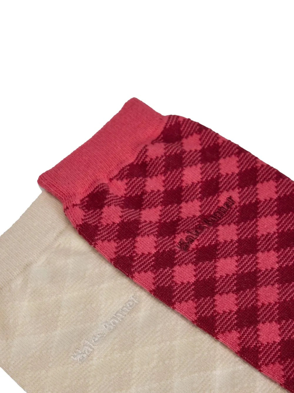 Close-up of craft pink and burgundy check pattern with co-branded Wales Bonner x Adidas label on the Check Socks in Craft Pink Core Brown – Wales Bonner x Adidas SS26