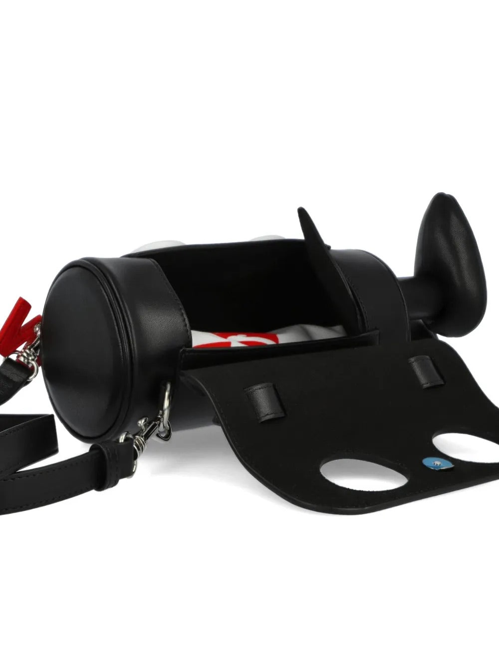 My Cilinder Friend Bag in Comb. I Black by Walter Van Beirendonck, angled top-down view showing zip closure, top handle and white circle appliques on black leather cylindrical bag with sculptural rounded feet