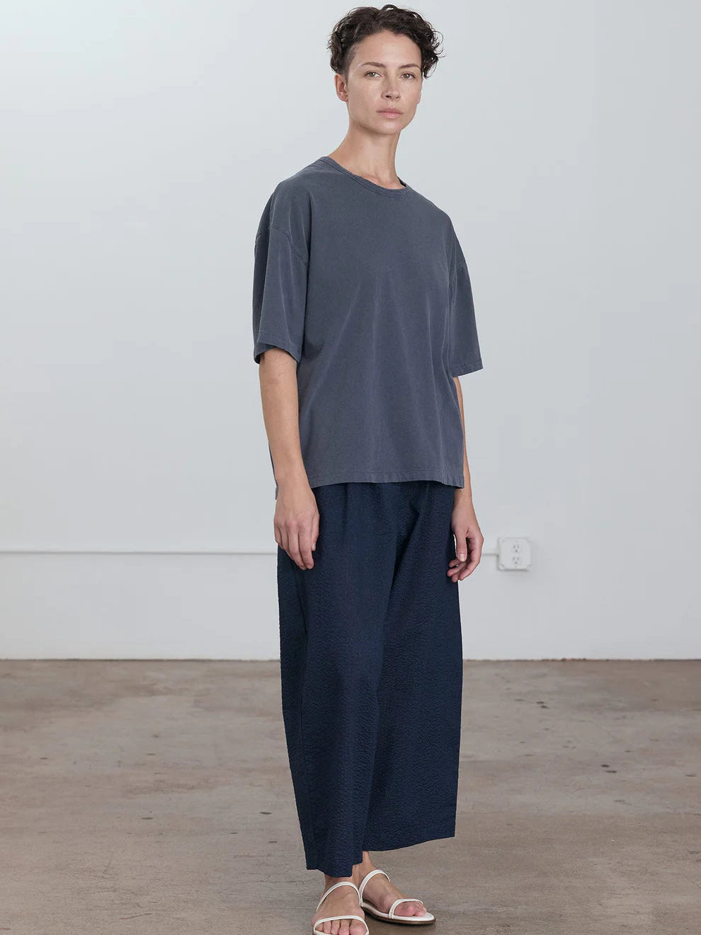 Black Crane Wide Short Sleeve Tee in Indigo - full length front view on model showing dropped shoulder and oversized fit