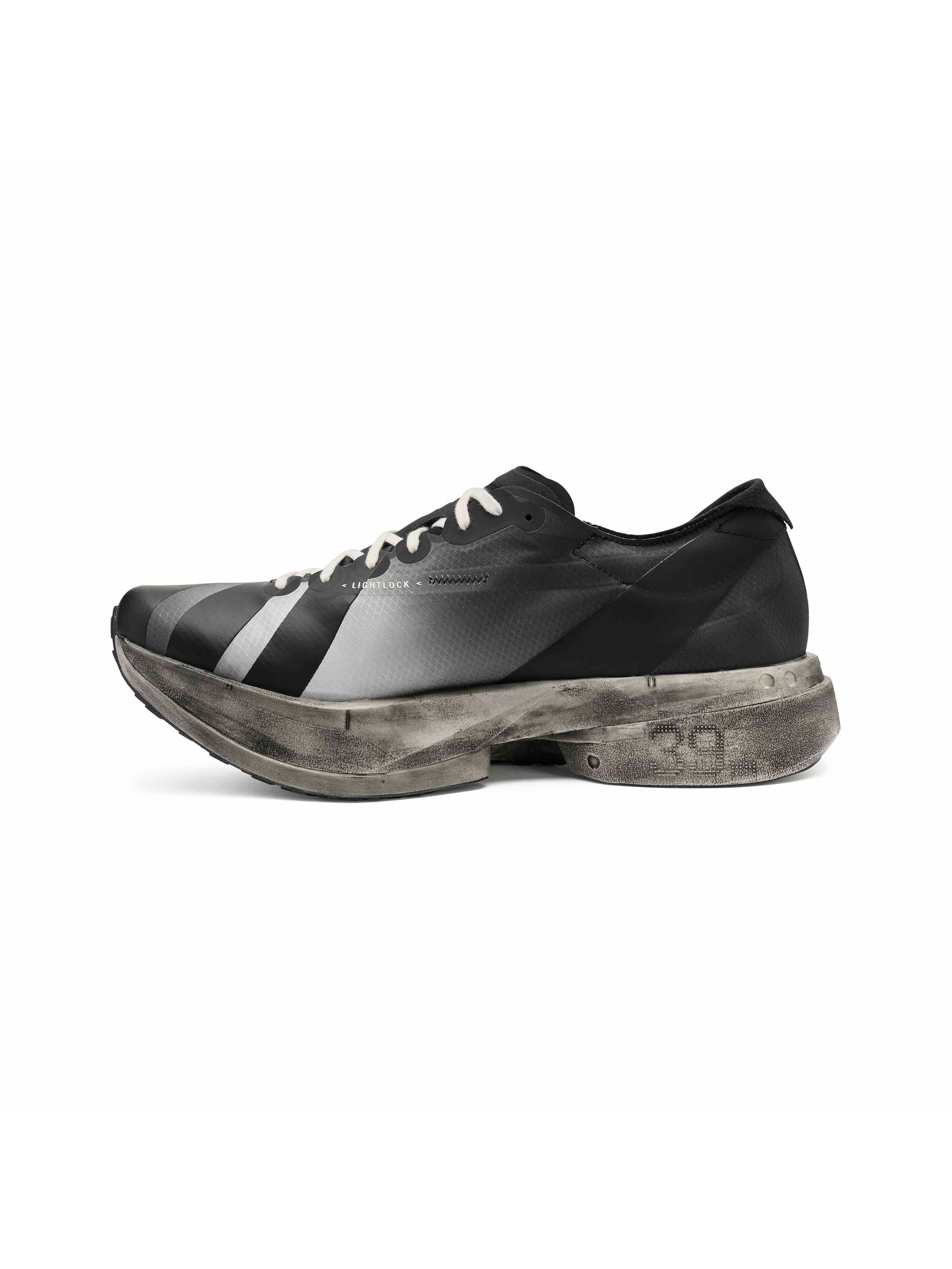Y-3 Adios Pro 4 front pair view, black road racing sneaker, off-white rope laces, streamlined toe, distressed midsole, unisex luxury performance footwear