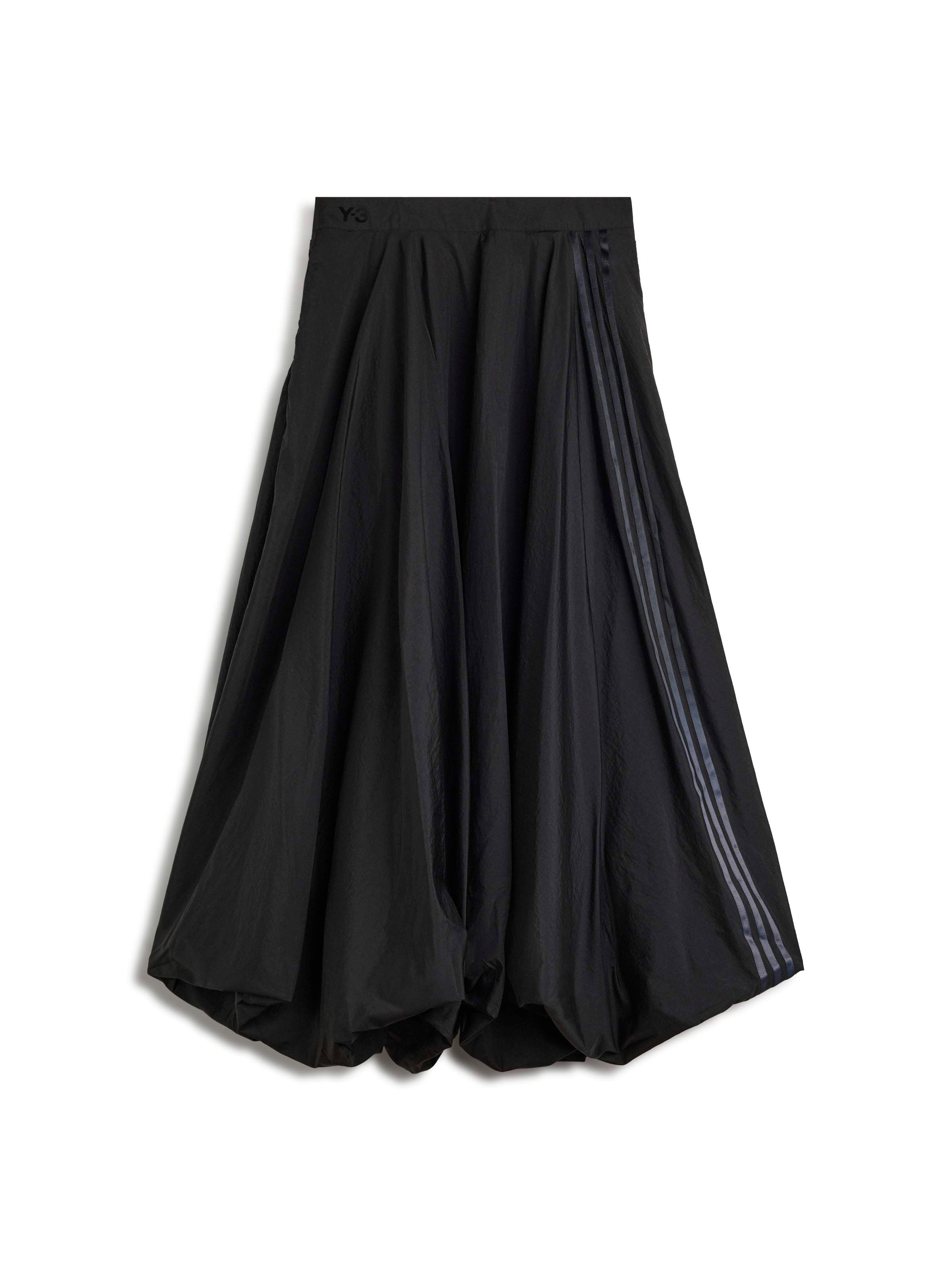 Y-3 Gradient 3-Stripes Balloon Skirt in Black, full front view, sculptural balloon midi silhouette, nylon taffeta with subtle sheen, tonal gradient 3-Stripes at side seam, elasticated Y-3 logo waistband, adjustable drawstring hem