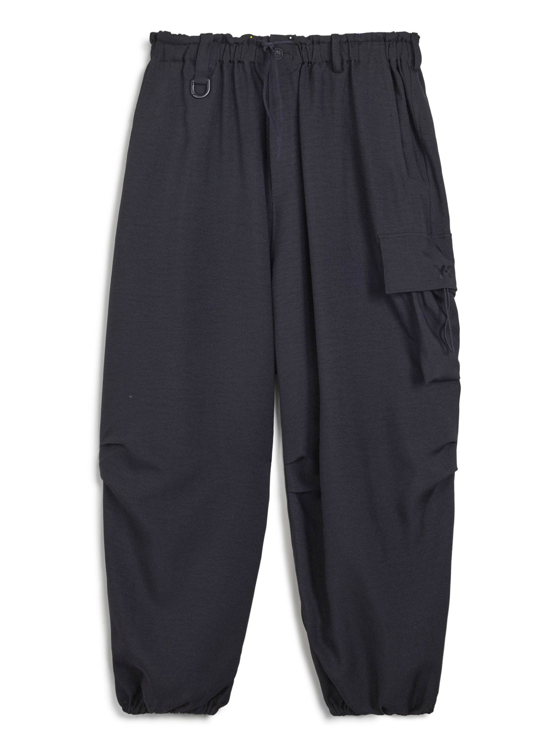 Front packshot of the Y-3 Sport Uniform Wide Cargo Trousers in Black, showing the wide-leg silhouette, elasticised waistband with front fly, integrated webbing belt with Fidlock® buckle, and multiple cargo pockets.