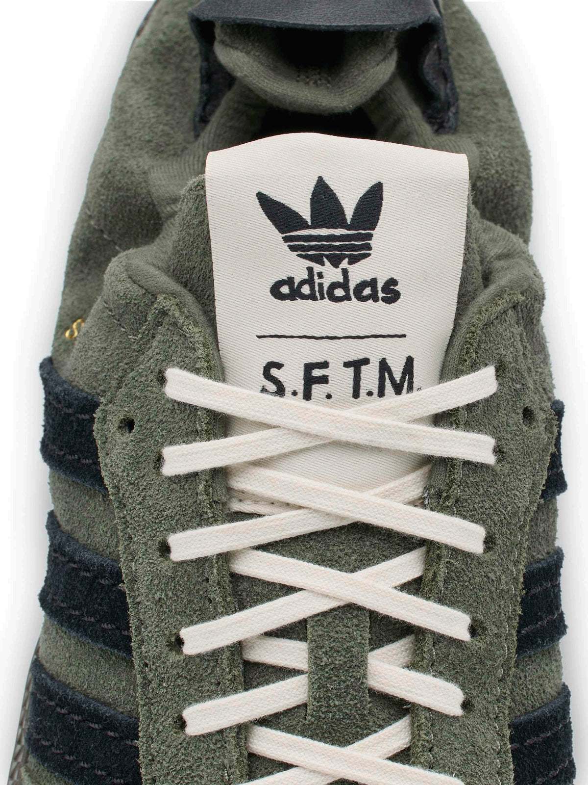 adidas x Song for the Mute ADI008 Samba OG SFTM sneaker, close-up of co-branded tongue label and laces.
