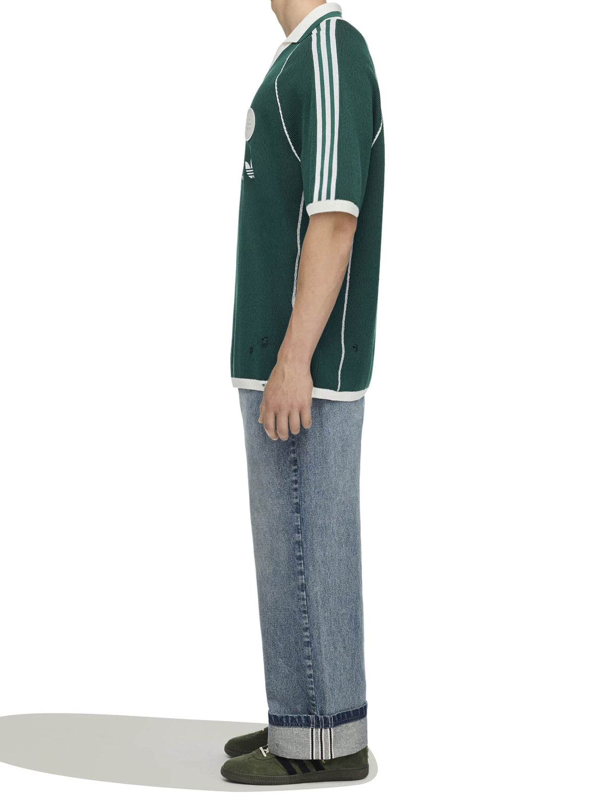Model wearing Adidas x Song for the Mute ADI008 Sweater Polo in Collegiate Green/Black side view
