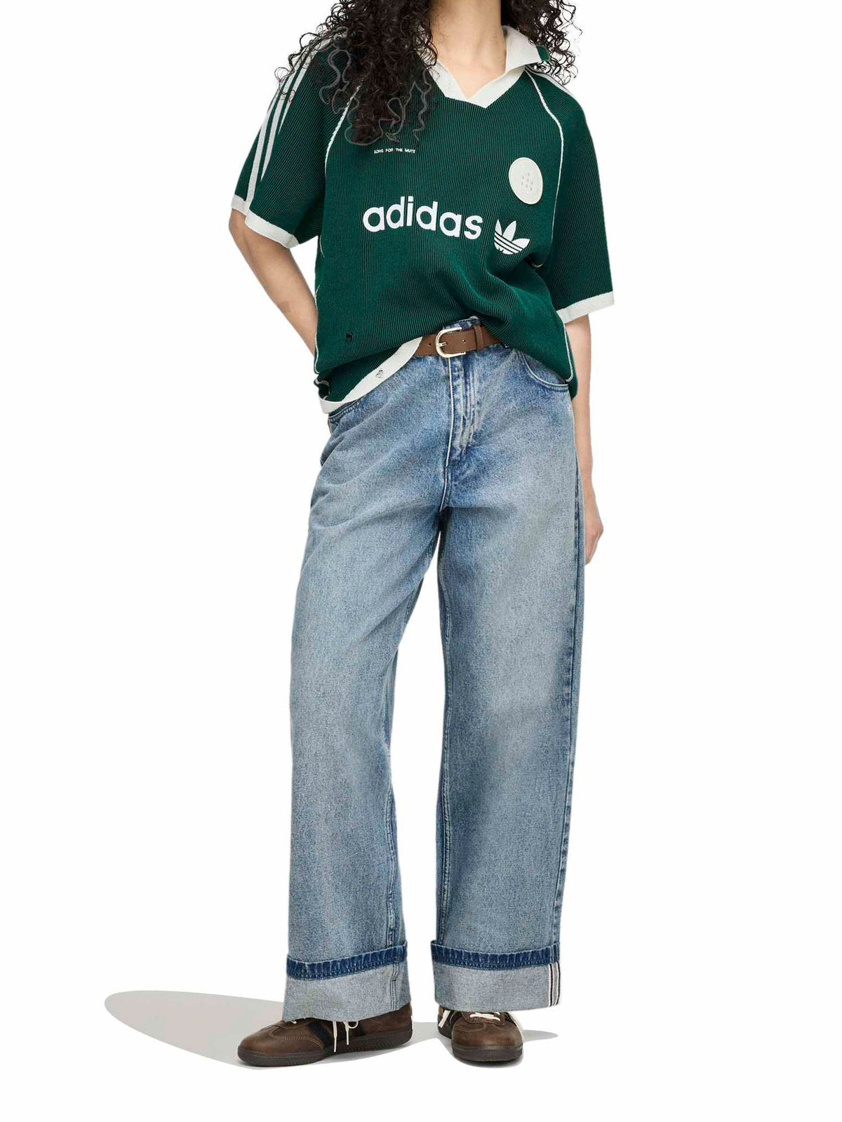 Model wearing Adidas x Song for the Mute ADI008 Sweater Polo in Collegiate Green/Black full front view