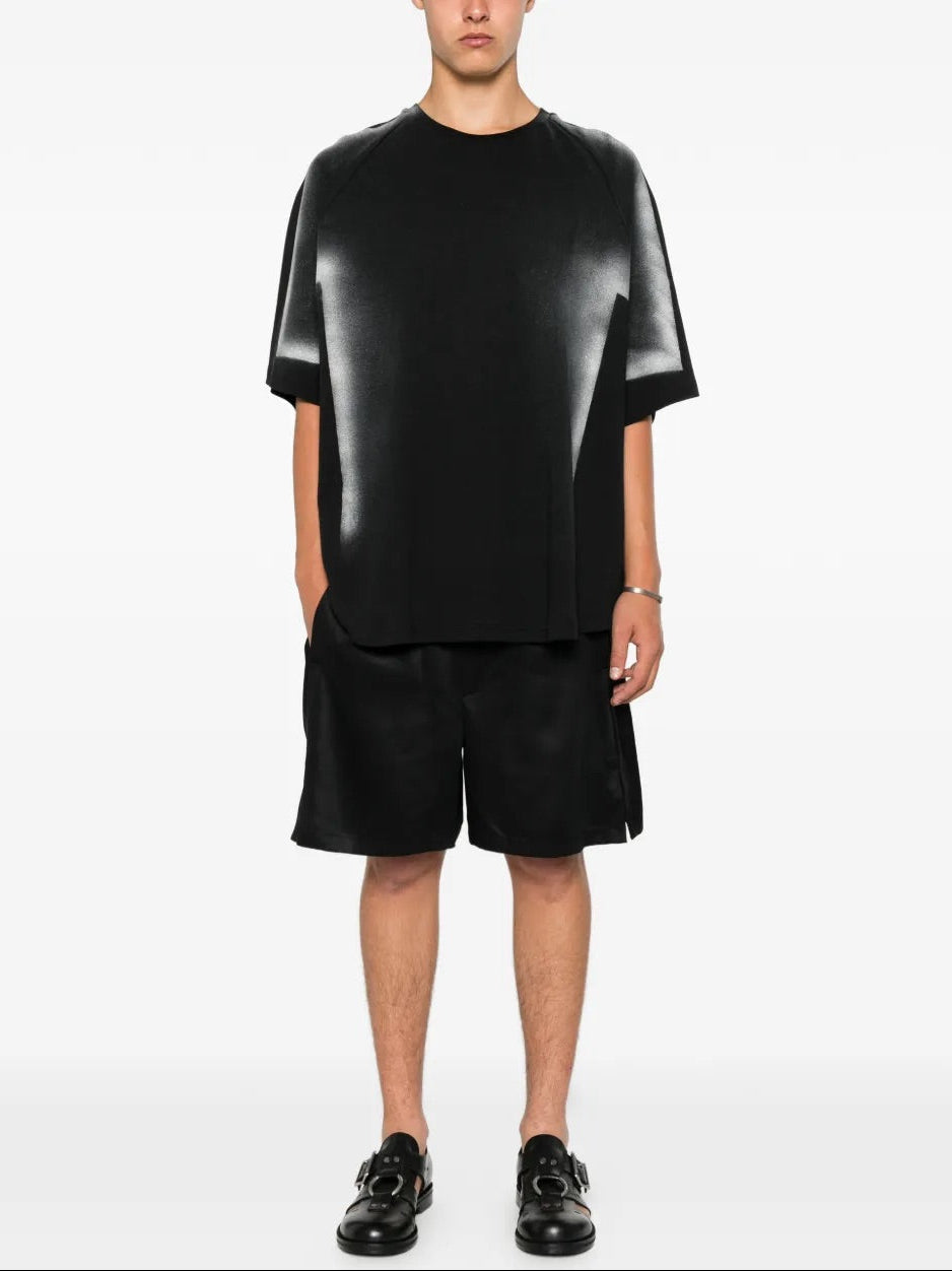 House Of The Very Islands Asher Pants in Black - full length front view on model showing satin-finish shorts with straight hem