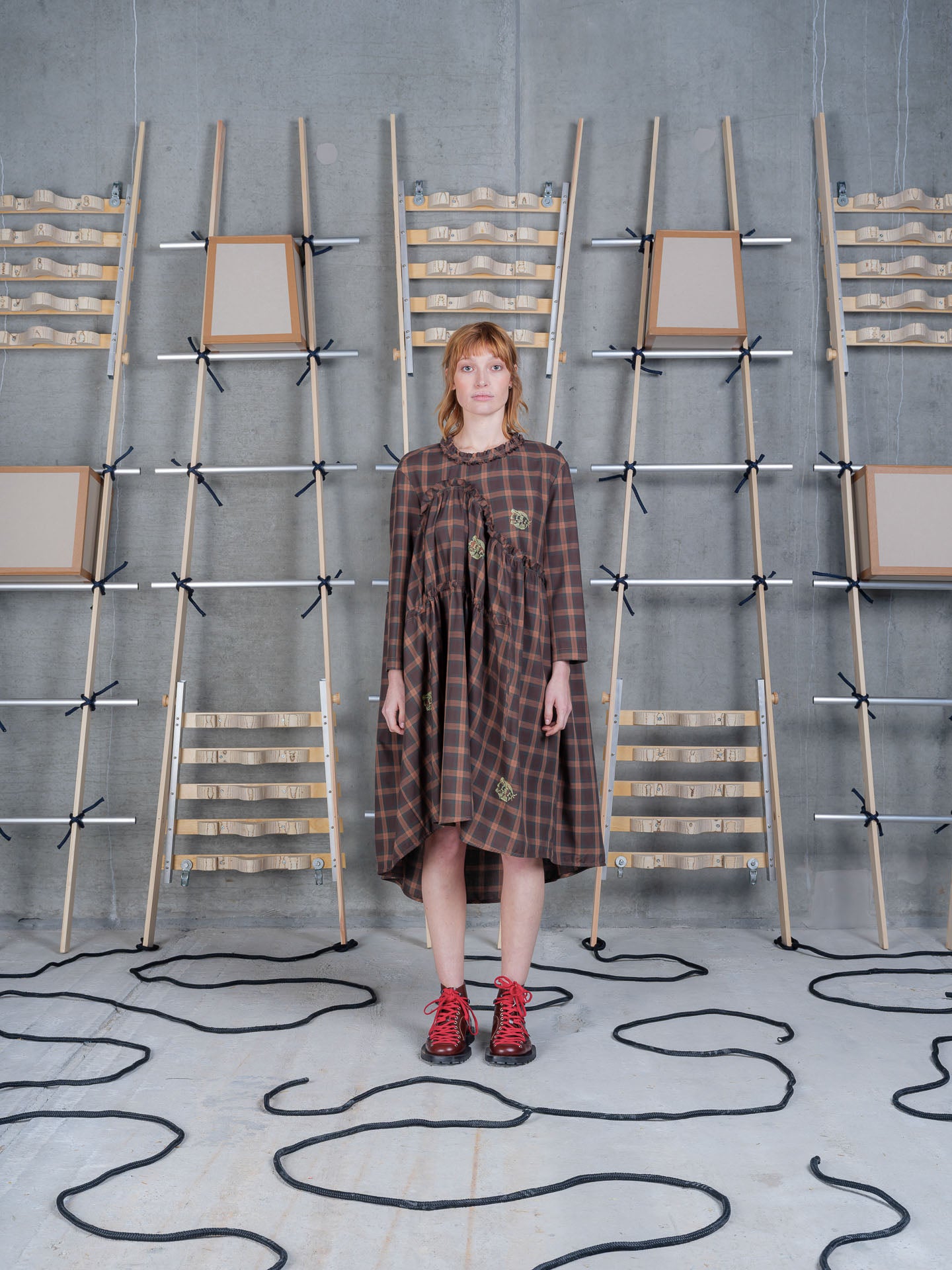 Henrik Vibskov Bon Chalant Dress LS in Brown Cotton Checks worn from the front, showcasing the relaxed silhouette.