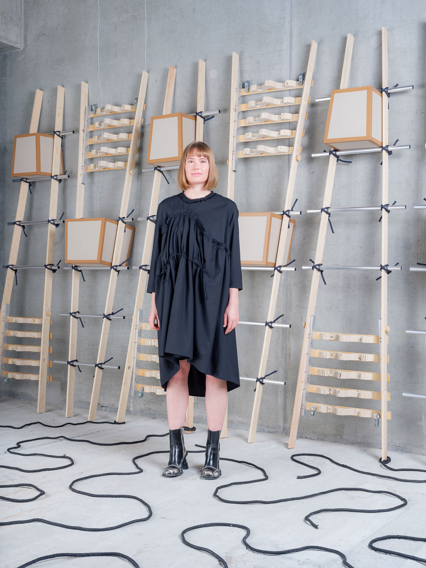 Model wearing Henrik Vibskov Bon Chalant Dress LS in Black front view
