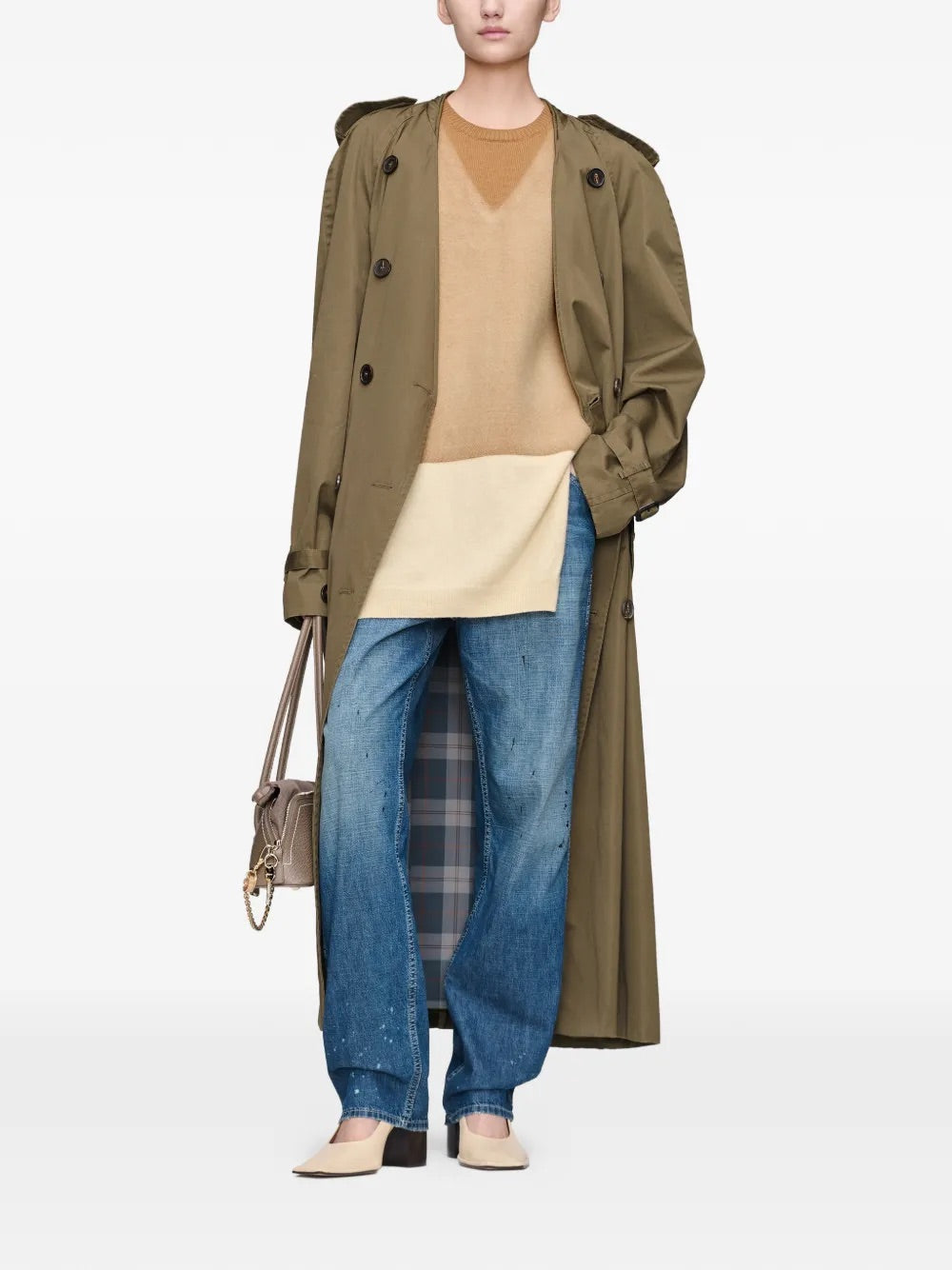 Model wearing Maison Margiela Fuse Knit Vest in Camel/Ecru with layered styling.