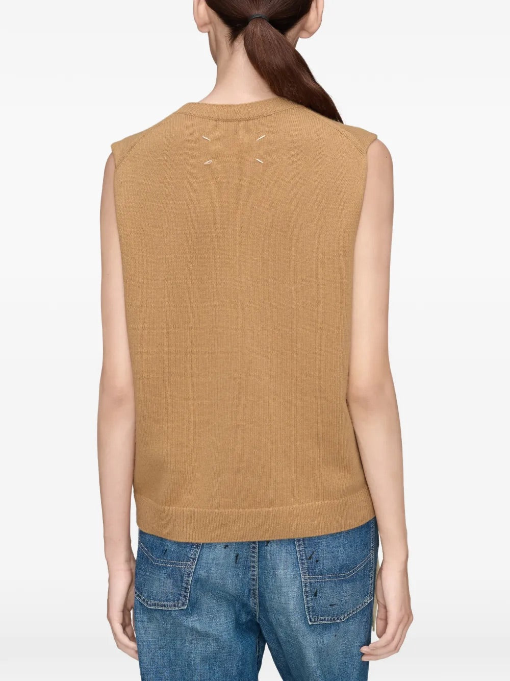 Model wearing Maison Margiela Fuse Knit Vest in Camel/Ecru, back view.