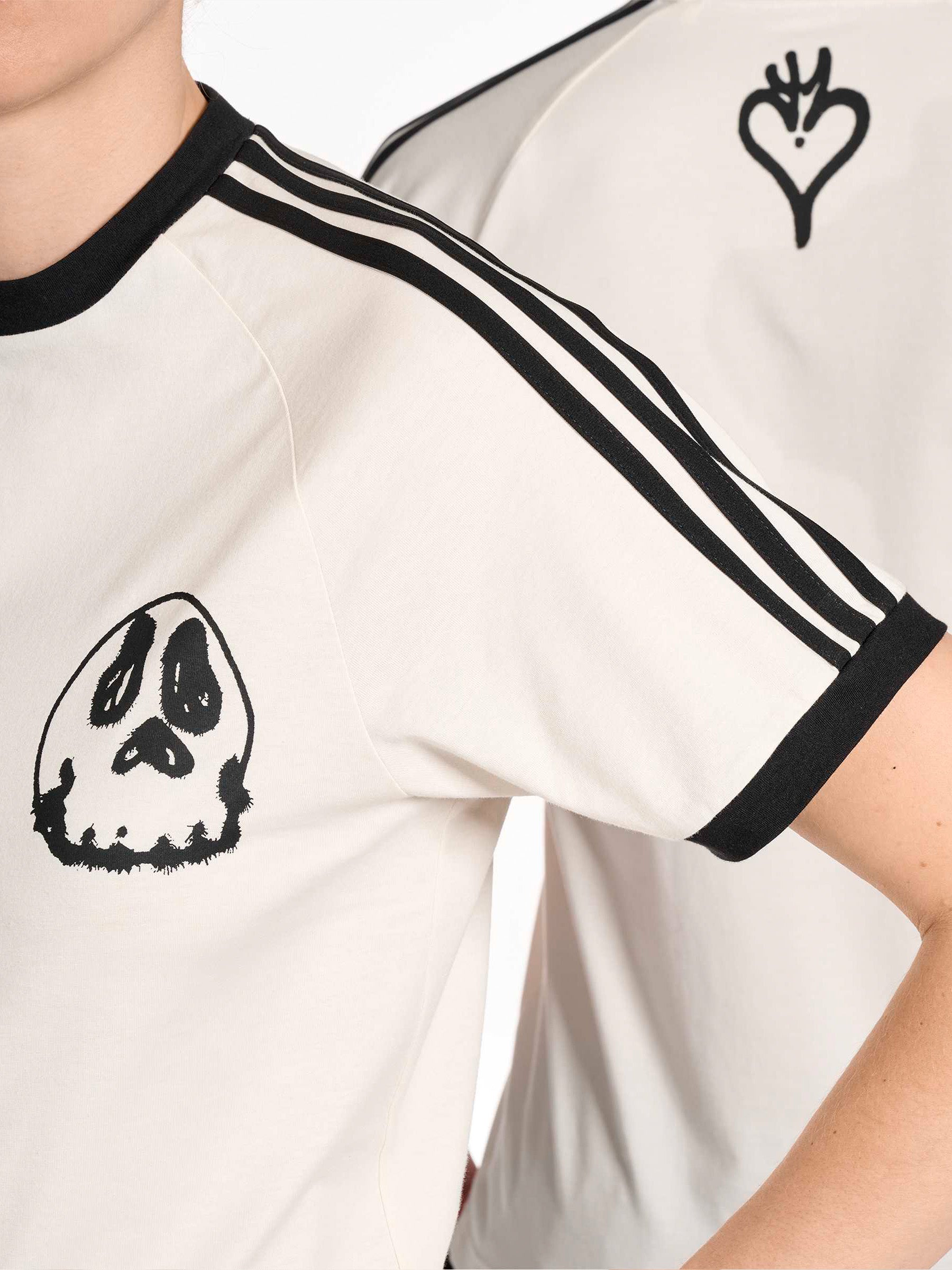 Y-3 Graphic Cali Short Sleeve Tee in Core White - detail view showing Chito graphic print and contrast tipping at collar