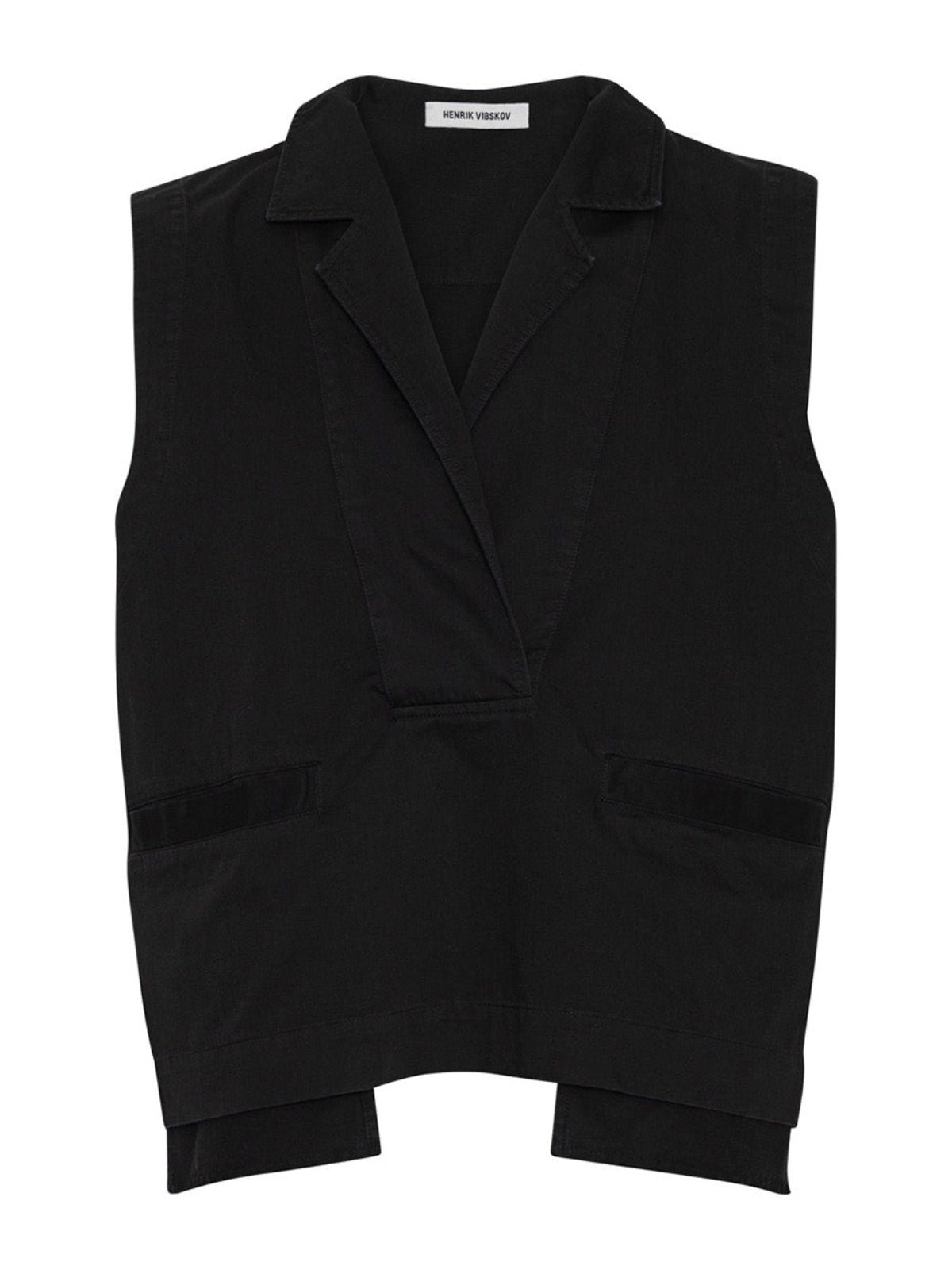 Henrik Vibskov Auto Vest Black, flat lay front, black organic cotton vest with lapel collar, velvet pocket trims, and asymmetric curved hem