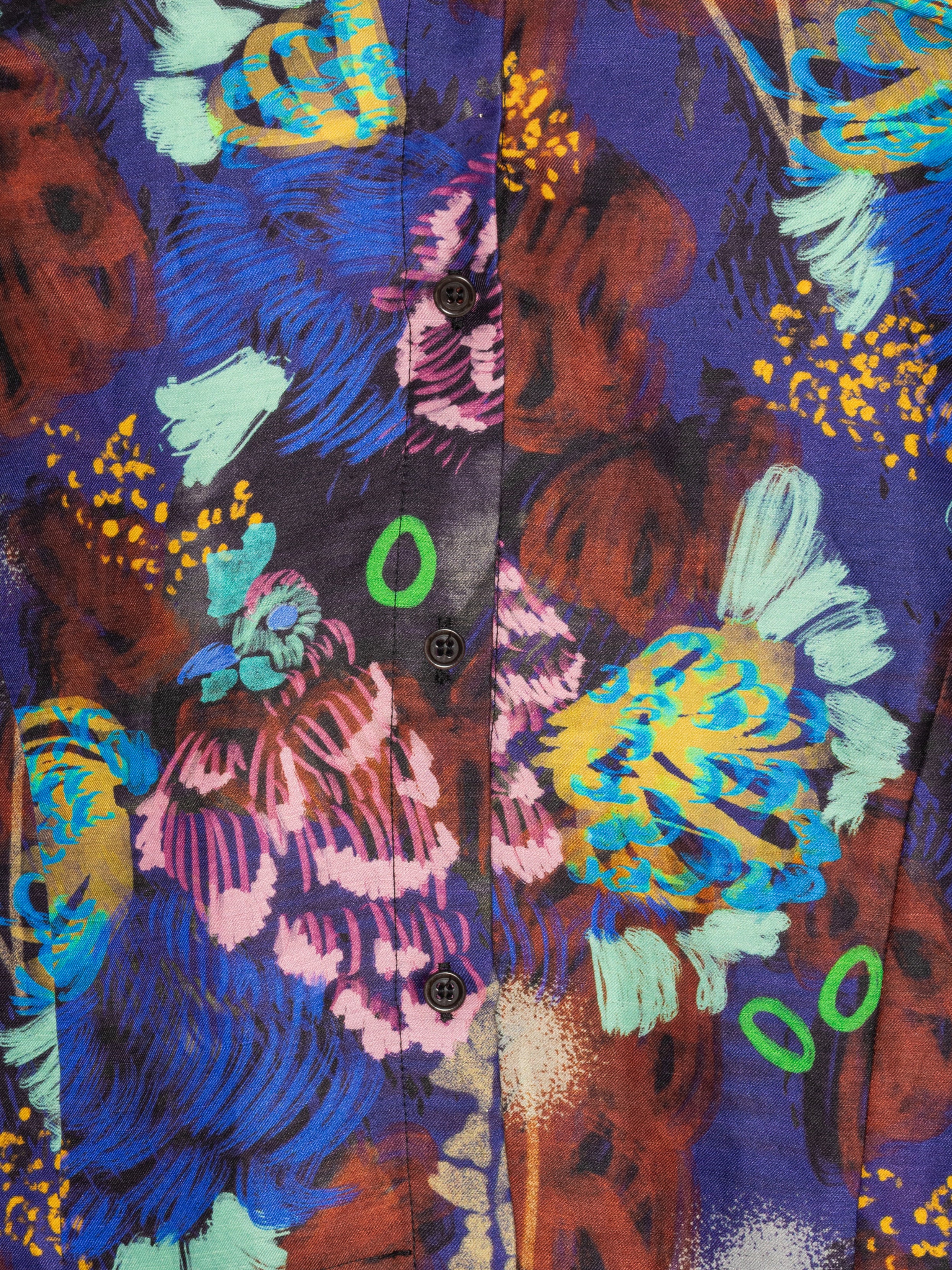 Close-up of the Case Shirt in Space Chickens from Henrik Vibskov Spring/Summer 2026 Studio Collection, highlighting the vibrant print, collar shape, button placket, and fabric details.