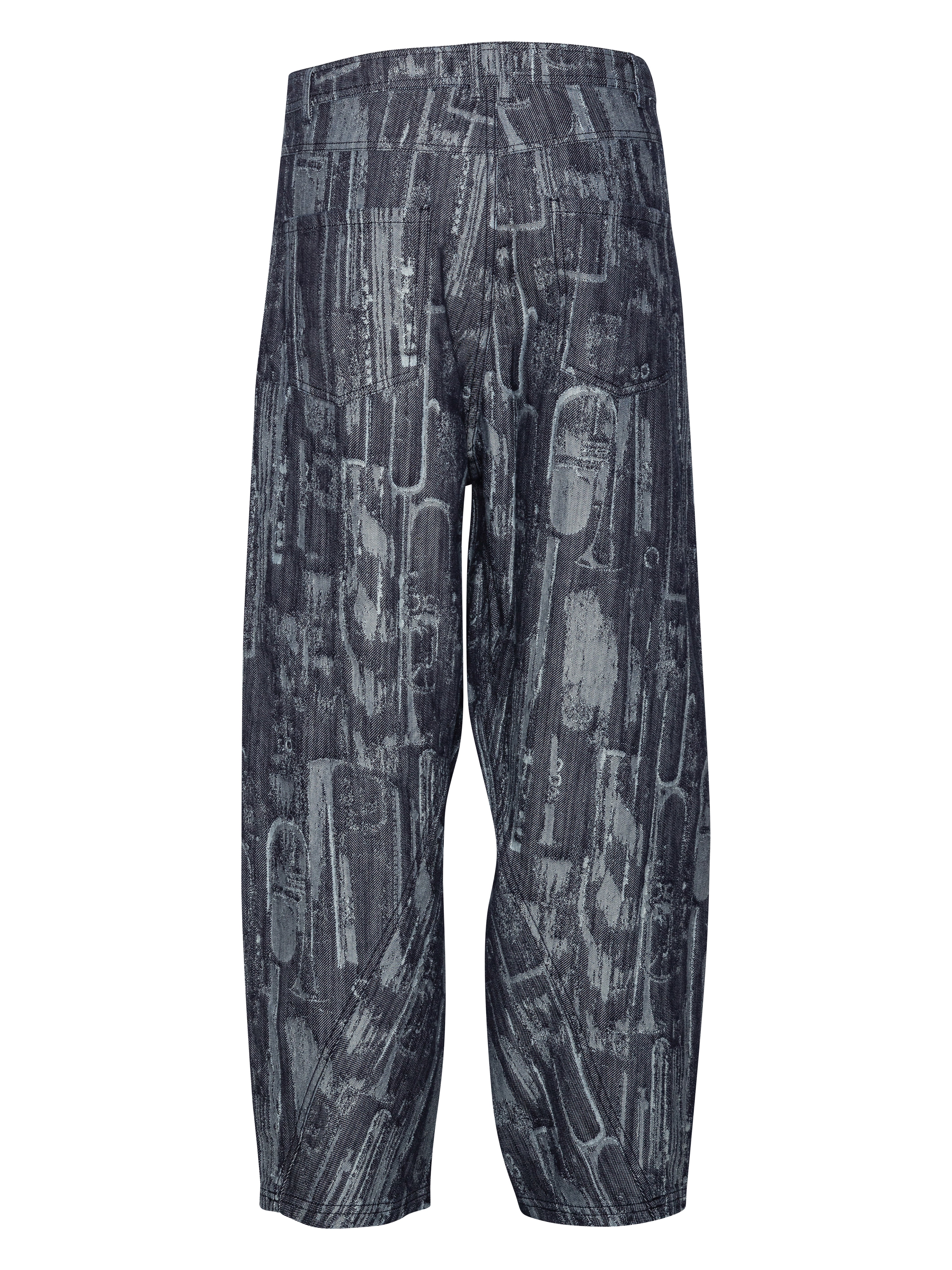 Back view of the Curved Denim Pants, highlighting the abstract pattern, back pockets, and straight-leg silhouette.